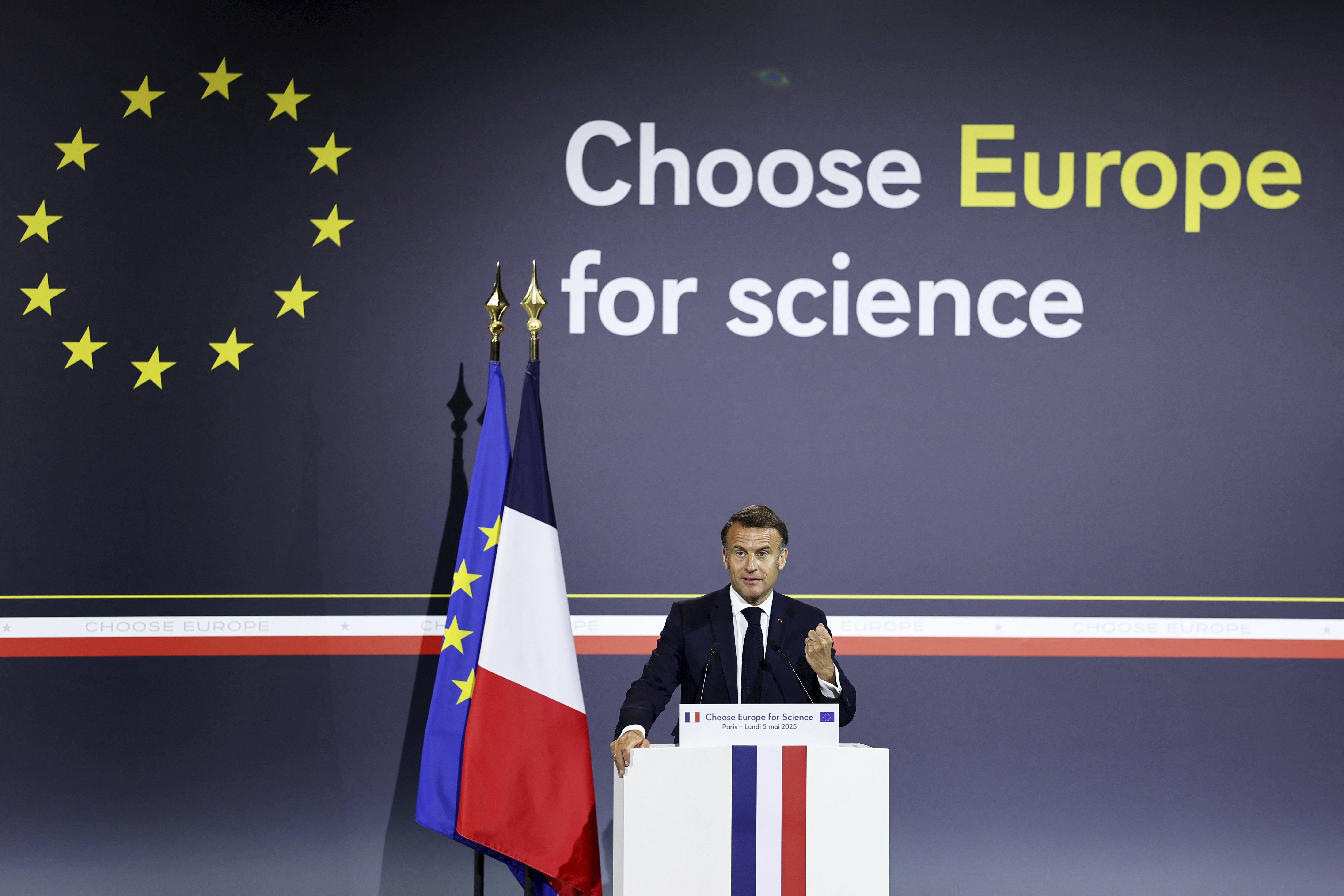 French President Emmanuel Macron delivers his speech at the "Choose Europe for Science" event, to encourage researchers and scientists from all over the world to practice in Europe, at the Sorbonne University in Paris, Monday, May 5, 2025.(Gonzalo Fuentes/Pool via AP)