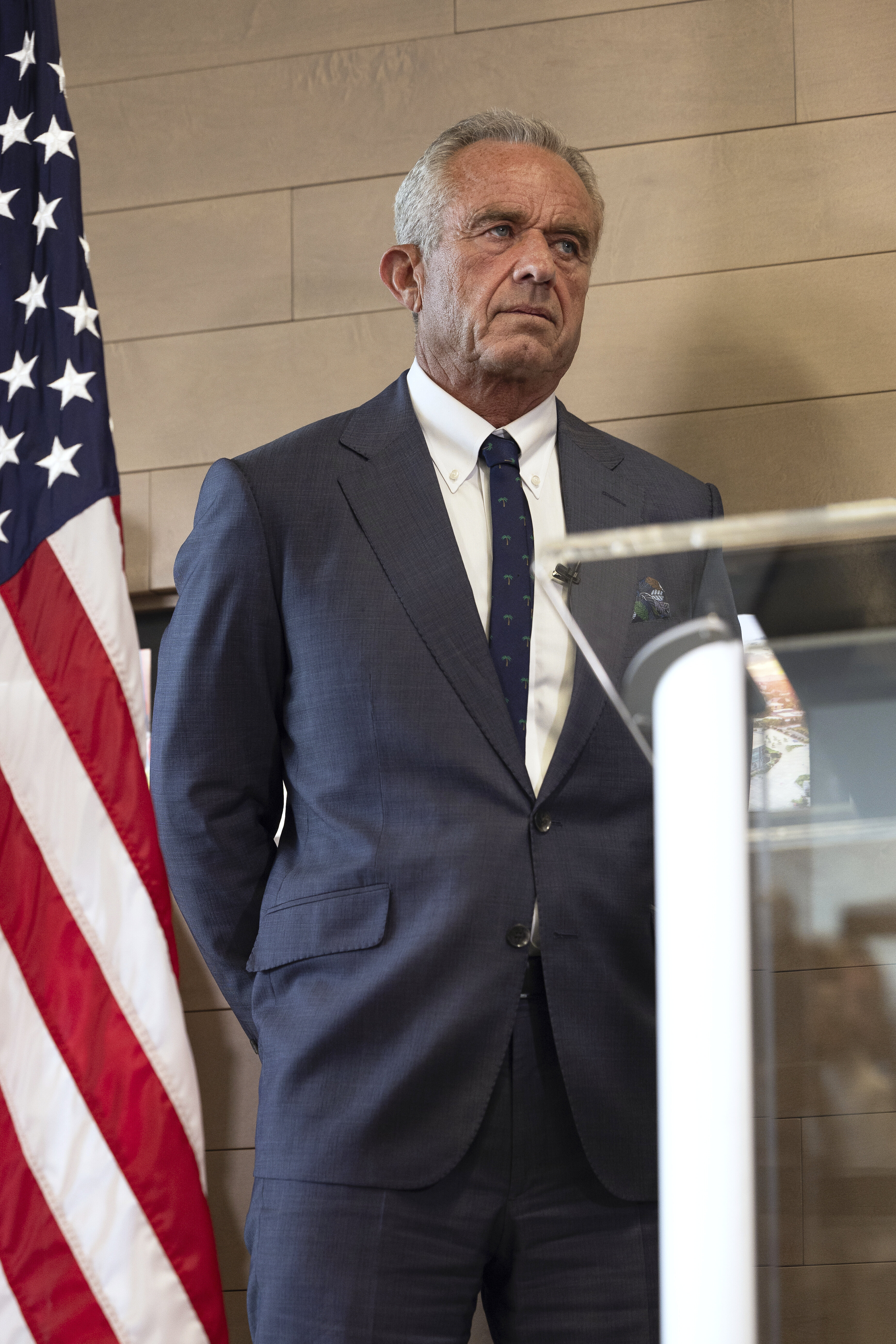 Health and Human Services Secretary Robert F. Kennedy Jr. listens during a press conference about Utah's new fluoride ban, food additives and SNAP funds legislation, Monday, April 7, 2025, in Salt Lake City. (AP Photo/Melissa Majchrzak)
