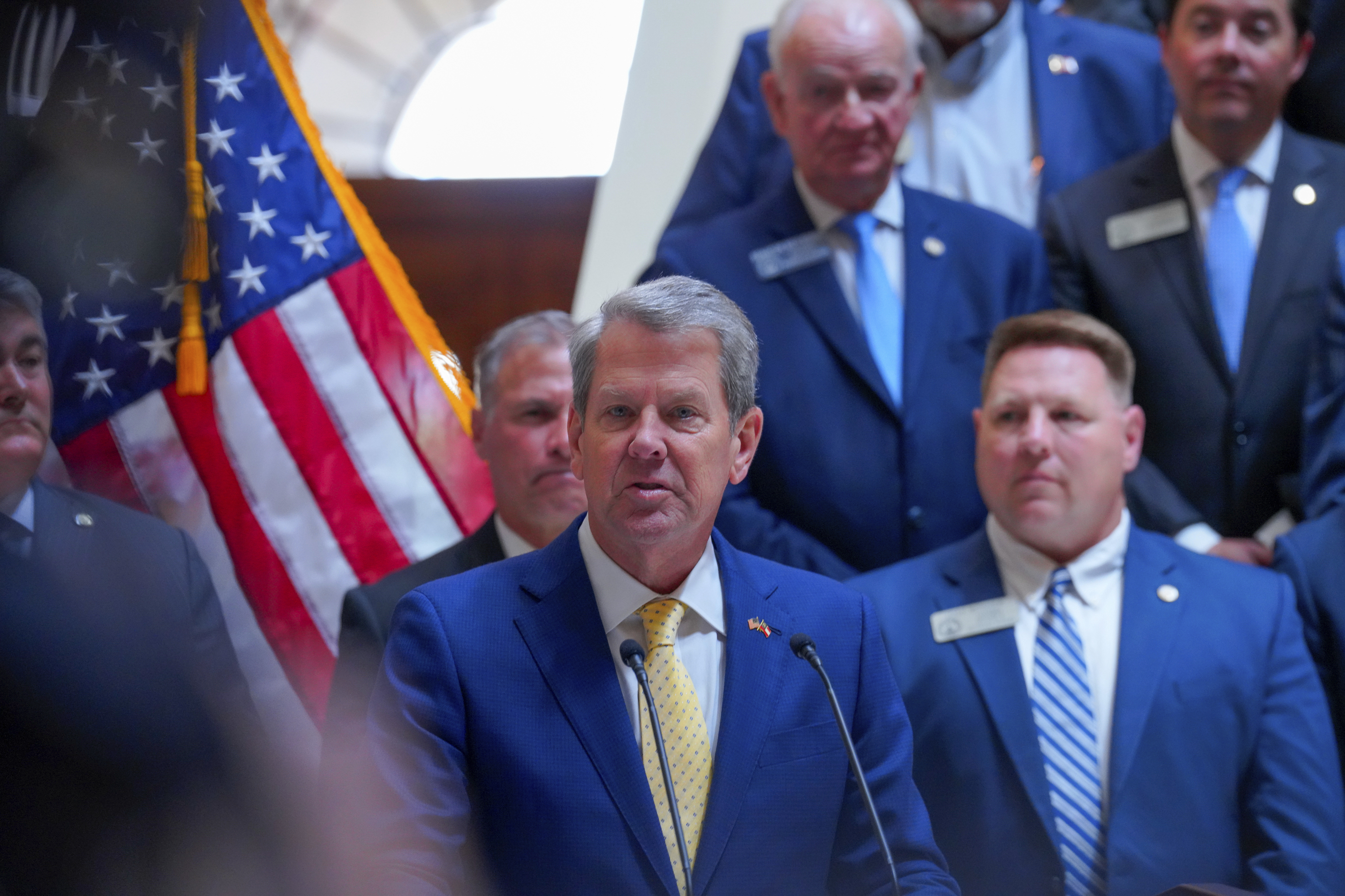 Georgia Gov. Brian Kemp signs legislation into law addressing eduction and school safety policies at the state Capitol on Monday, April 28, 2025, in Atlanta. (Matthew Pearson/WABE via AP)