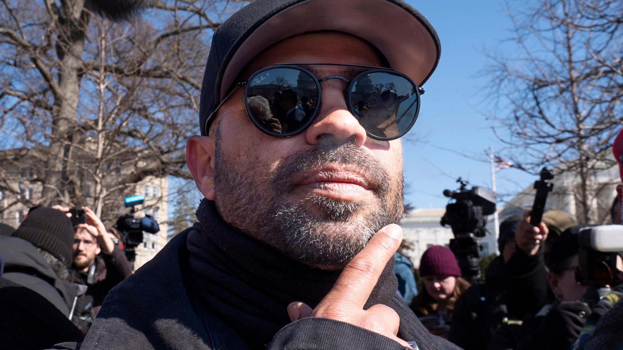 FILE - Former Proud Boys leader Enrique Tarrio attends a news conference outside the U.S. Capitol in Washington, Feb. 21, 2025. (AP Photo/J. Scott Applewhite, File)