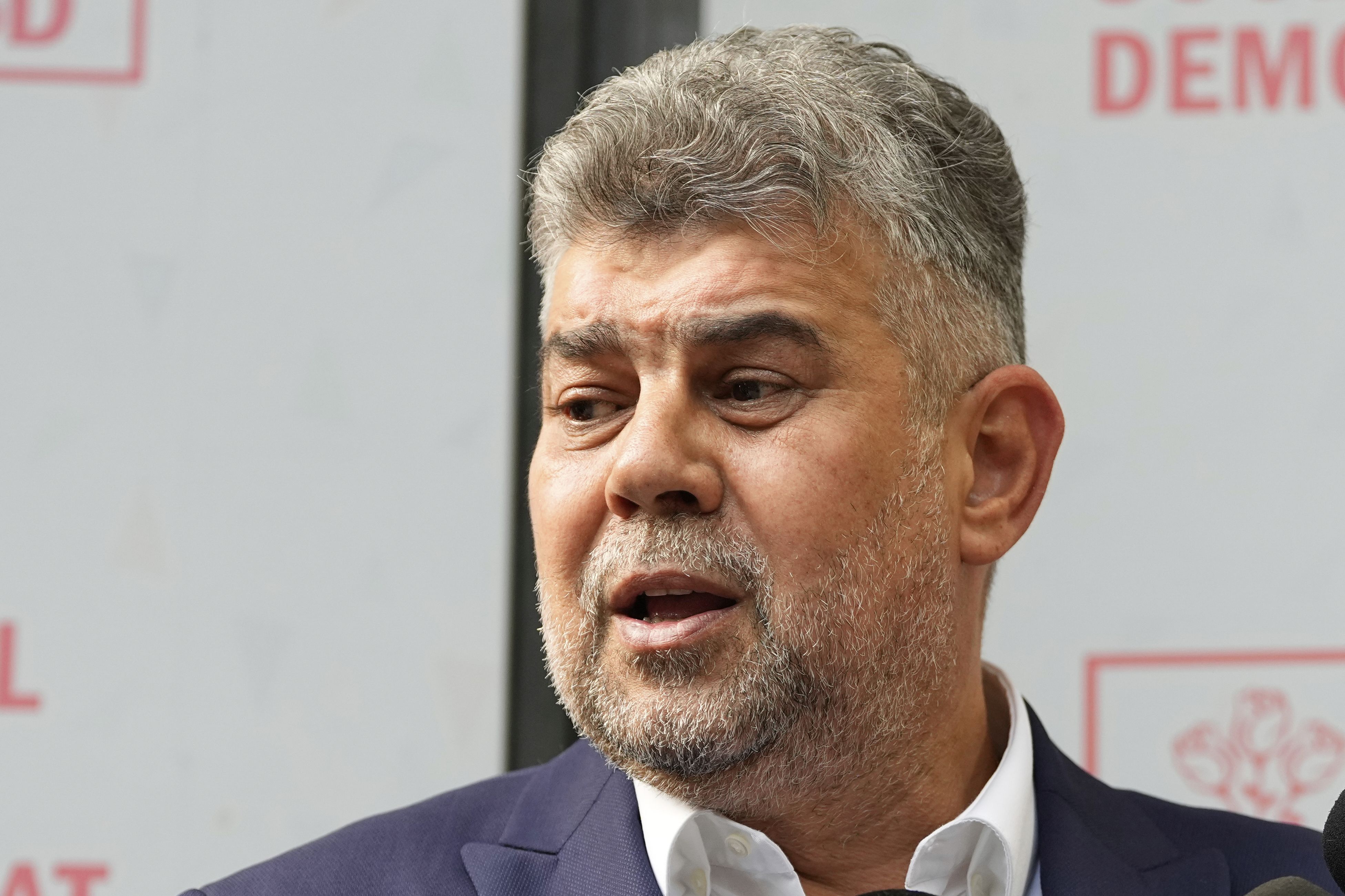 Romanian Prime Minister Marcel Ciolacu speaks to media at the PSD headquarters, in Bucharest, Romania, Monday, May 5, 2025, the day after the governing coalition's candidate failed to advance to the runoff in the presidential election rerun. (AP Photo/Andreea Alexandru)