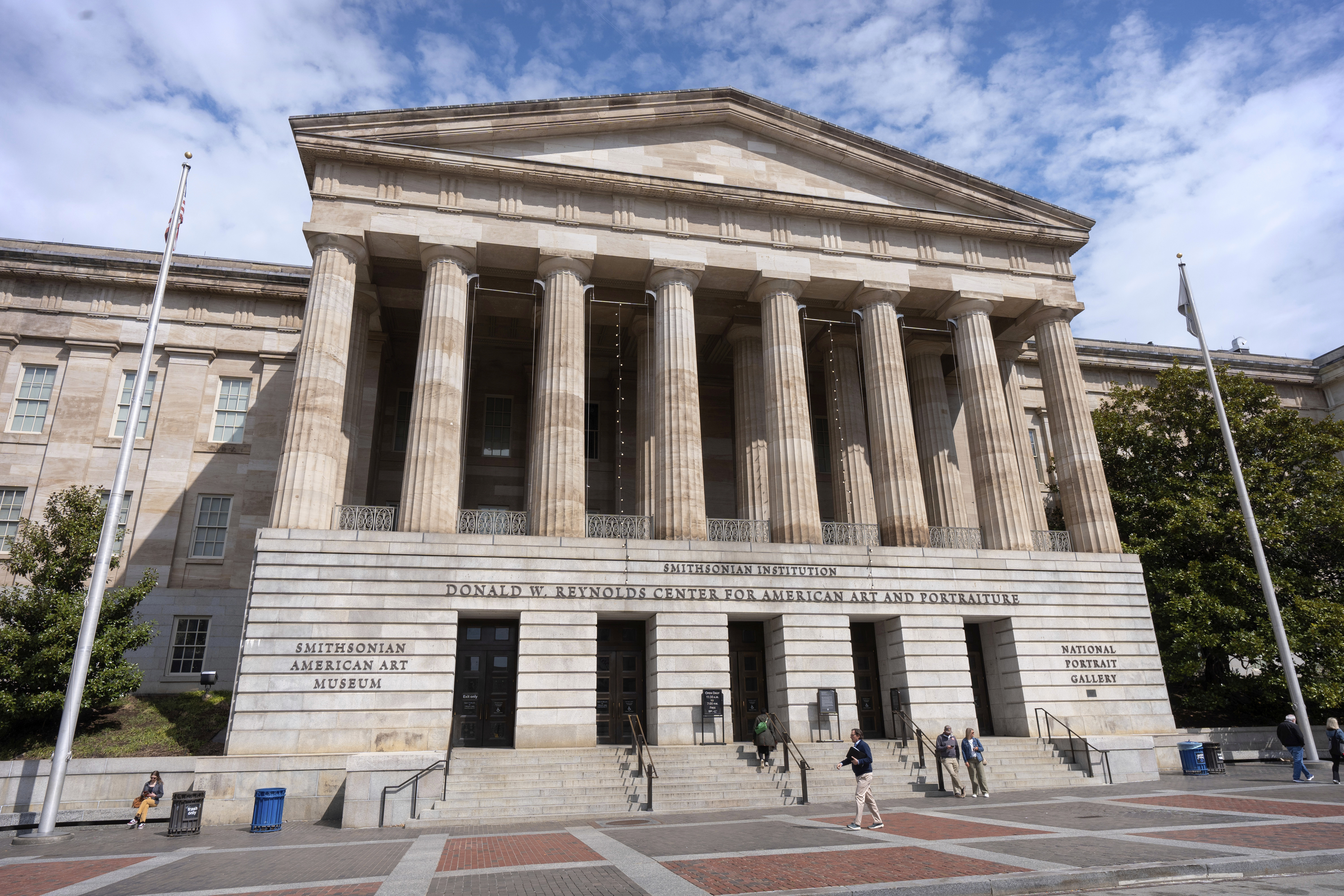 FILE - The Donald W. Reynolds Center for American Art and Portraiture, home of the National Portrait Gallery and the Smithsonian American Art Museum, is seen, March 28, 2025, in Washington. (AP Photo/Mark Schiefelbein, File)