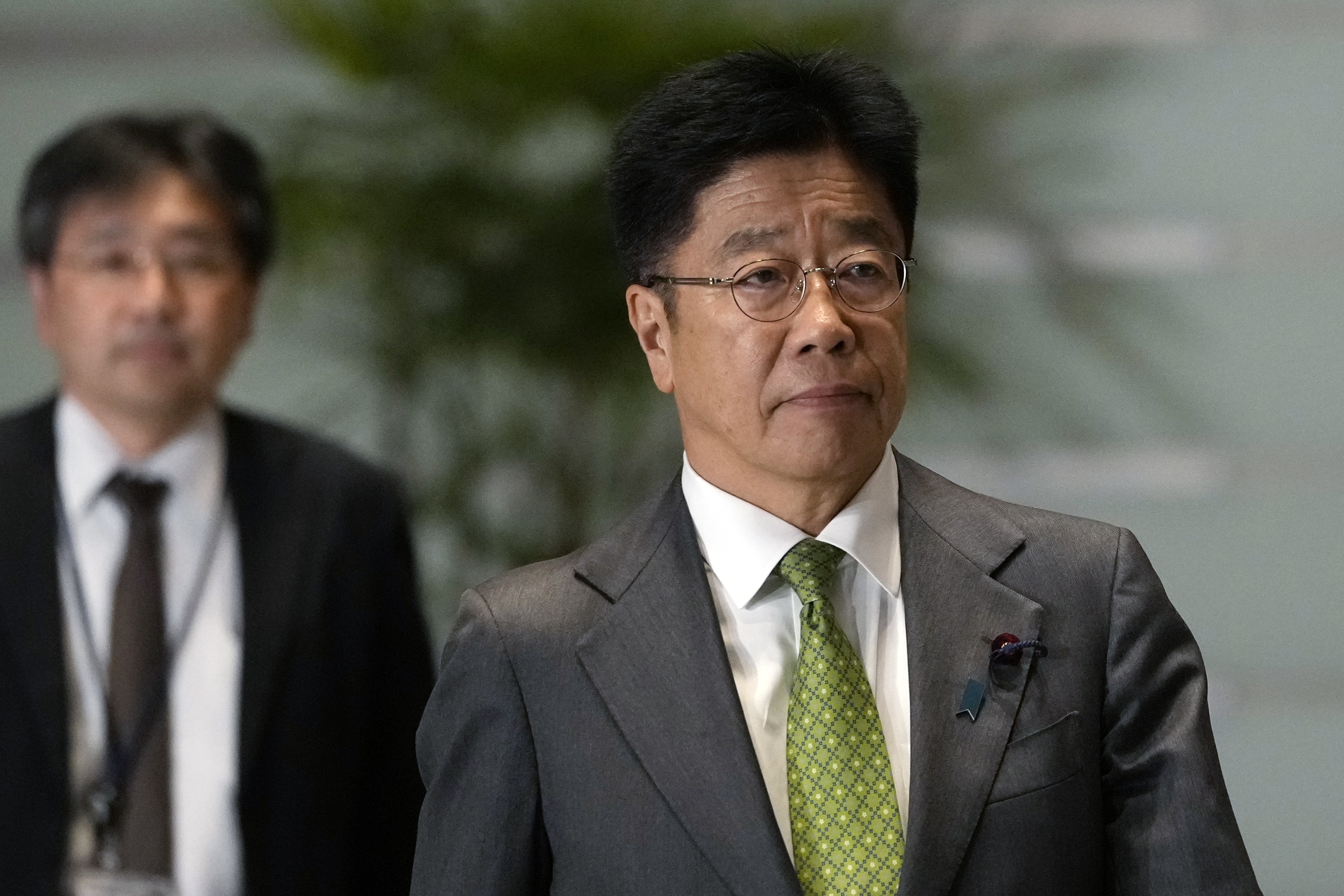 FILE - Finance Minister Katsunobu Kato arrives at the prime minister's office Monday, Nov. 11, 2024, in Tokyo. (AP Photo/Shuji Kajiyama, file)