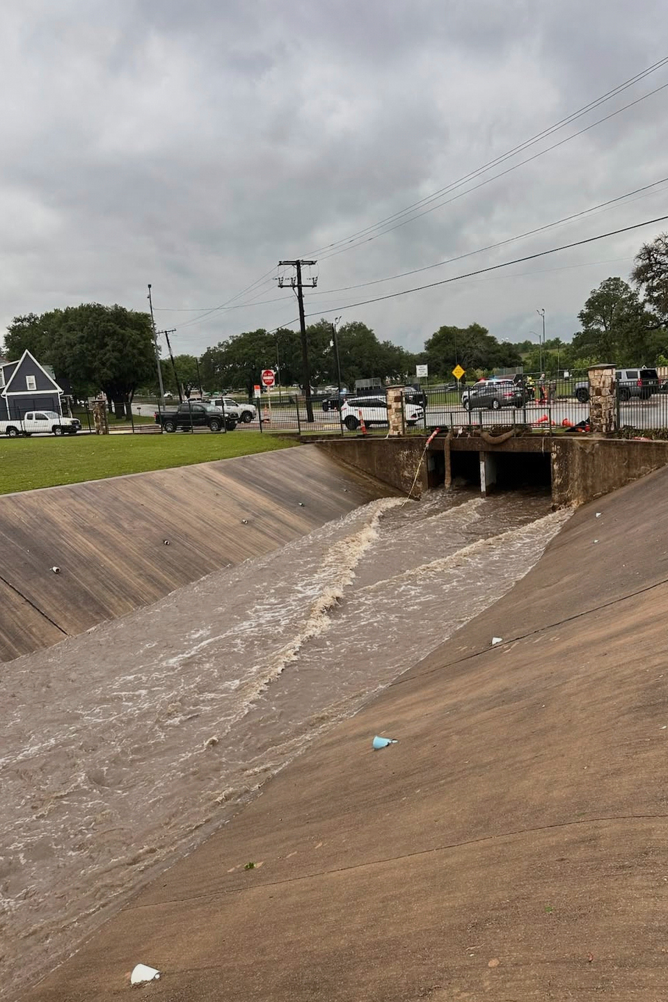 This photo provided by the City of Brenham shows a creek in Brenham, Texas, on Monday, May 5, 2025, where rescue crews searched for a missing 10-year-old girl who authorities say was swept away by rising waters.(Melinda Gordon/City of Brenham via AP)