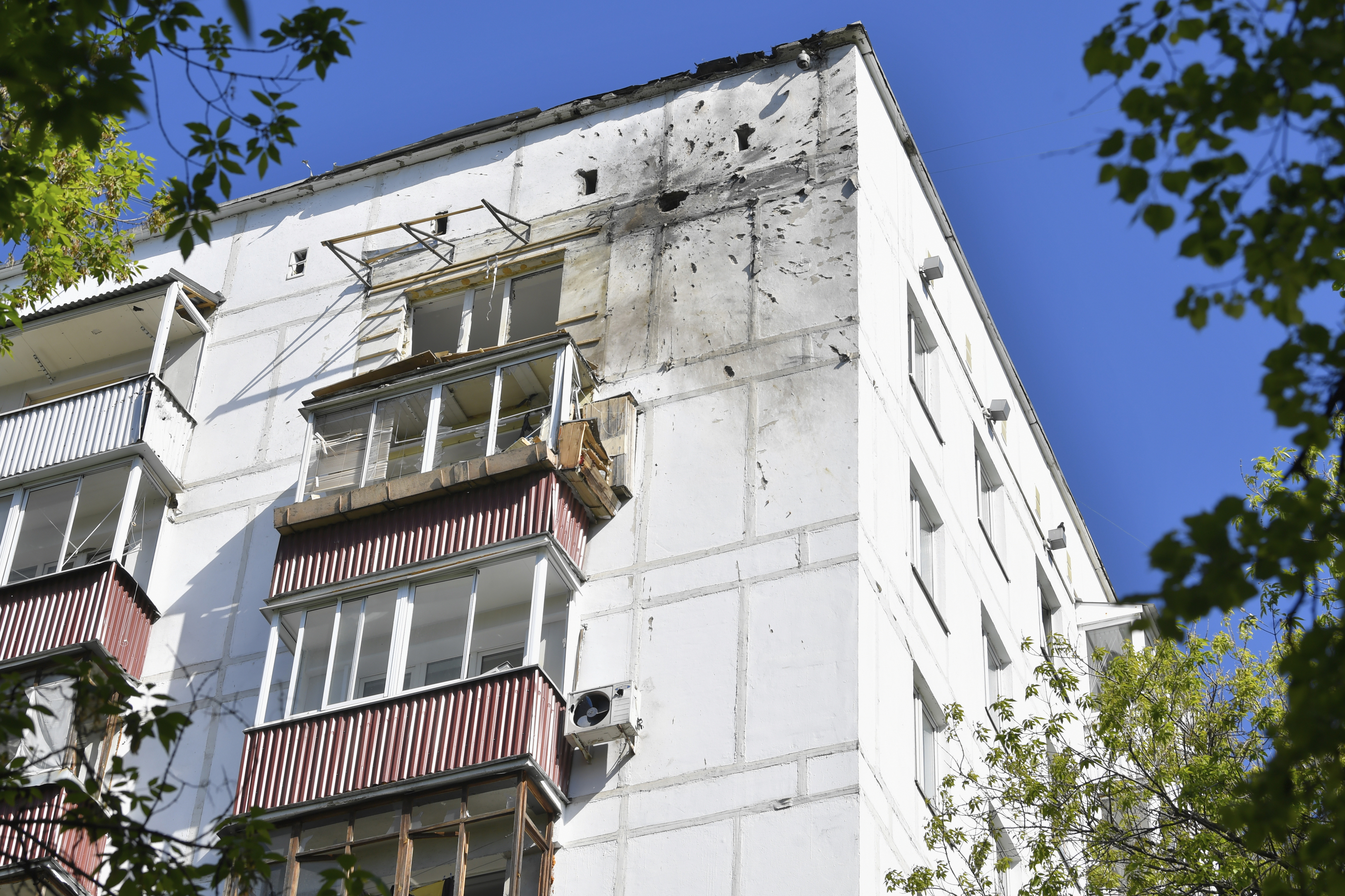 This photo shows an apartment building where the downed Ukrainian drone fell at in Moscow, Russia, Tuesday, May 6, 2025. (AP Photo)