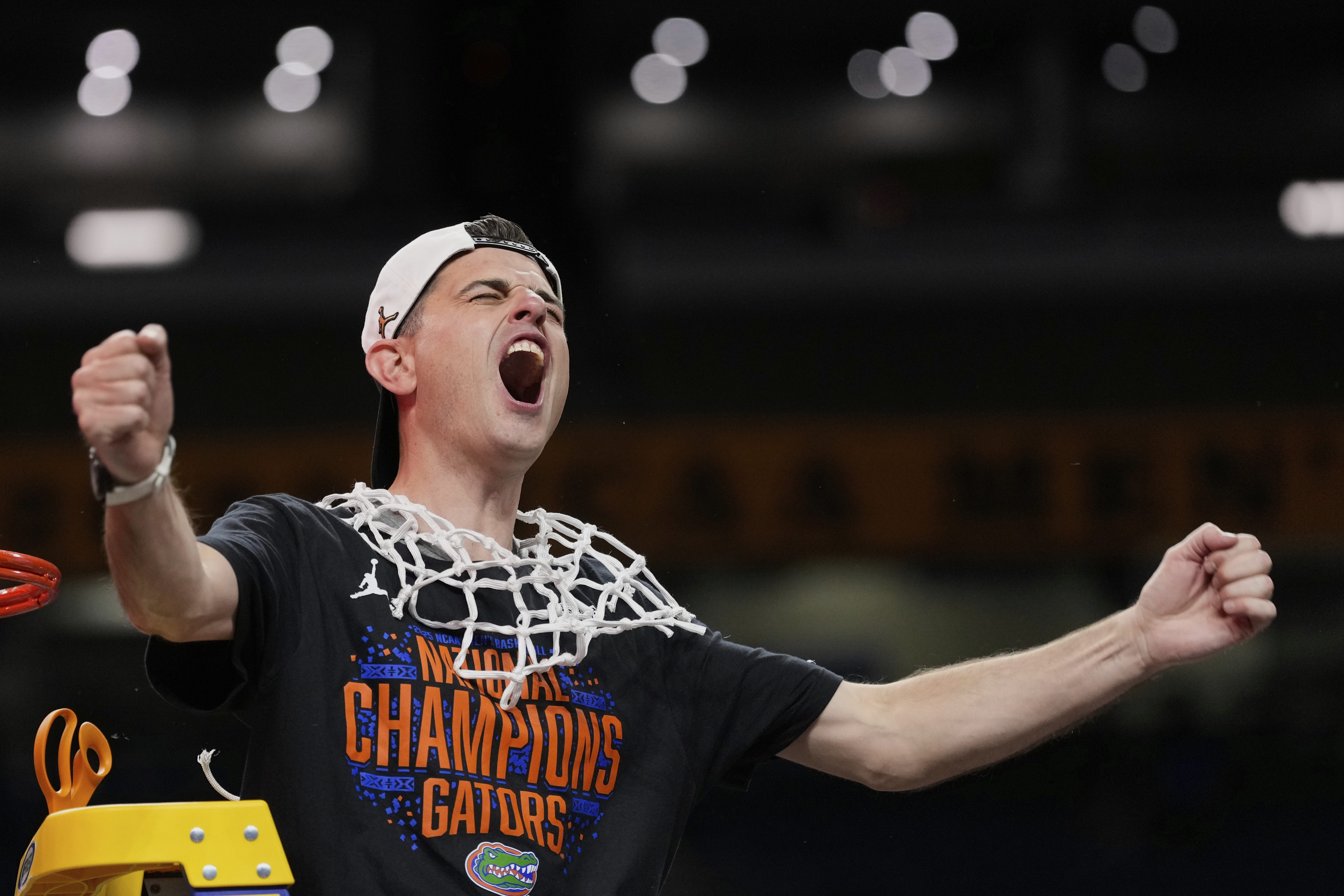 Florida head coach Todd Golden celebrates after Florida beat Houston in the national championship at the Final Four of the NCAA college basketball tournament, Monday, April 7, 2025, in San Antonio. (AP Photo/Eric Gay)