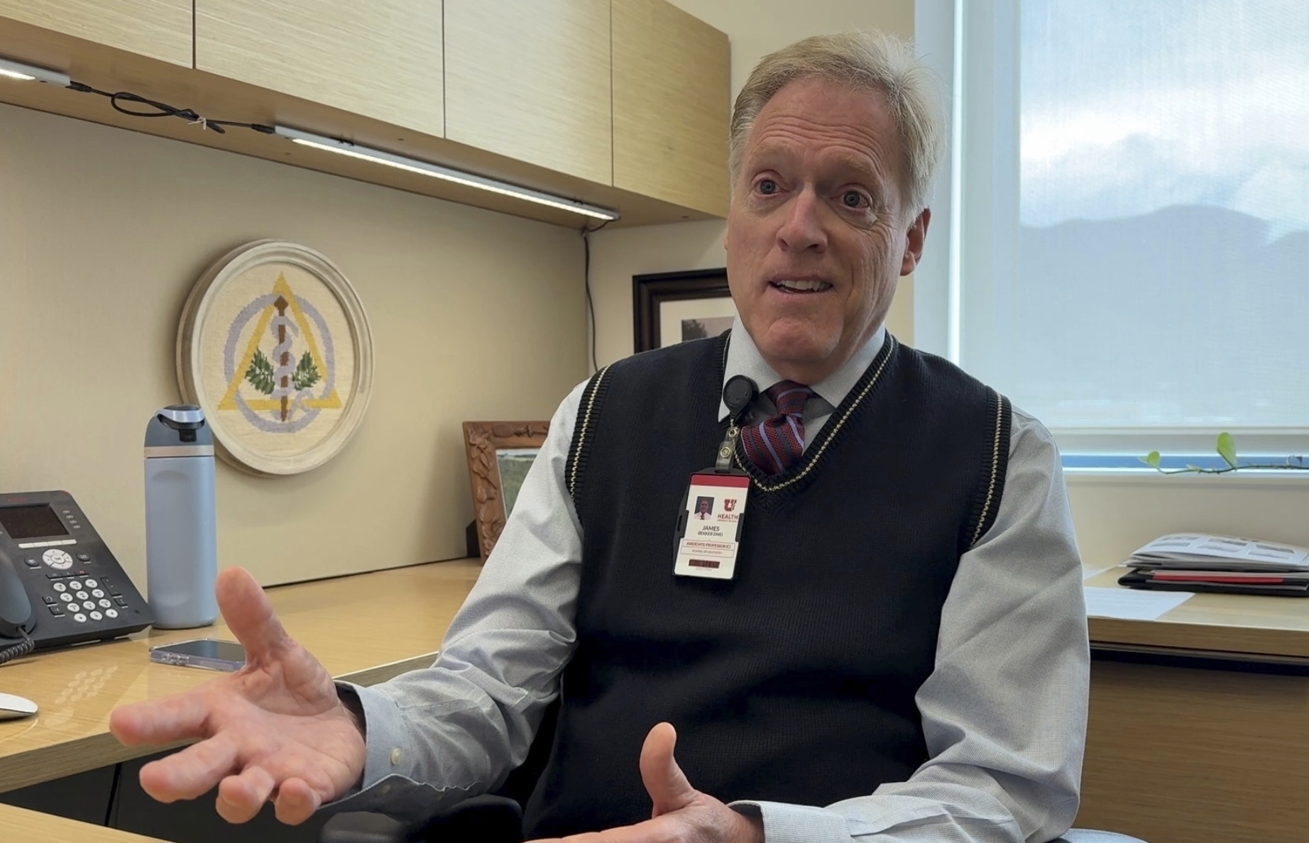 Dr. James Bekker, a dentist in Salt Lake City, explains in an interview on April 30, 2025, how he is preparing his patients and dental students for Utah's first-in-the-nation fluoride ban to take effect May 7, 2025. (AP Photo/Hannah Schoenbaum)