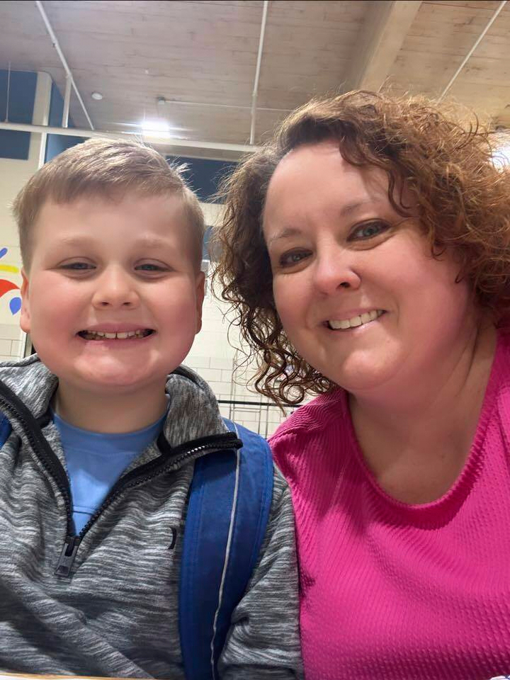 This image provided by Holly LaFavers shows Holly LaFavers posing for a photo with her 8-year-old son Liam Wednesday, April 23, 2025, in Lexington, Ky. (Holly LaFavers via AP)