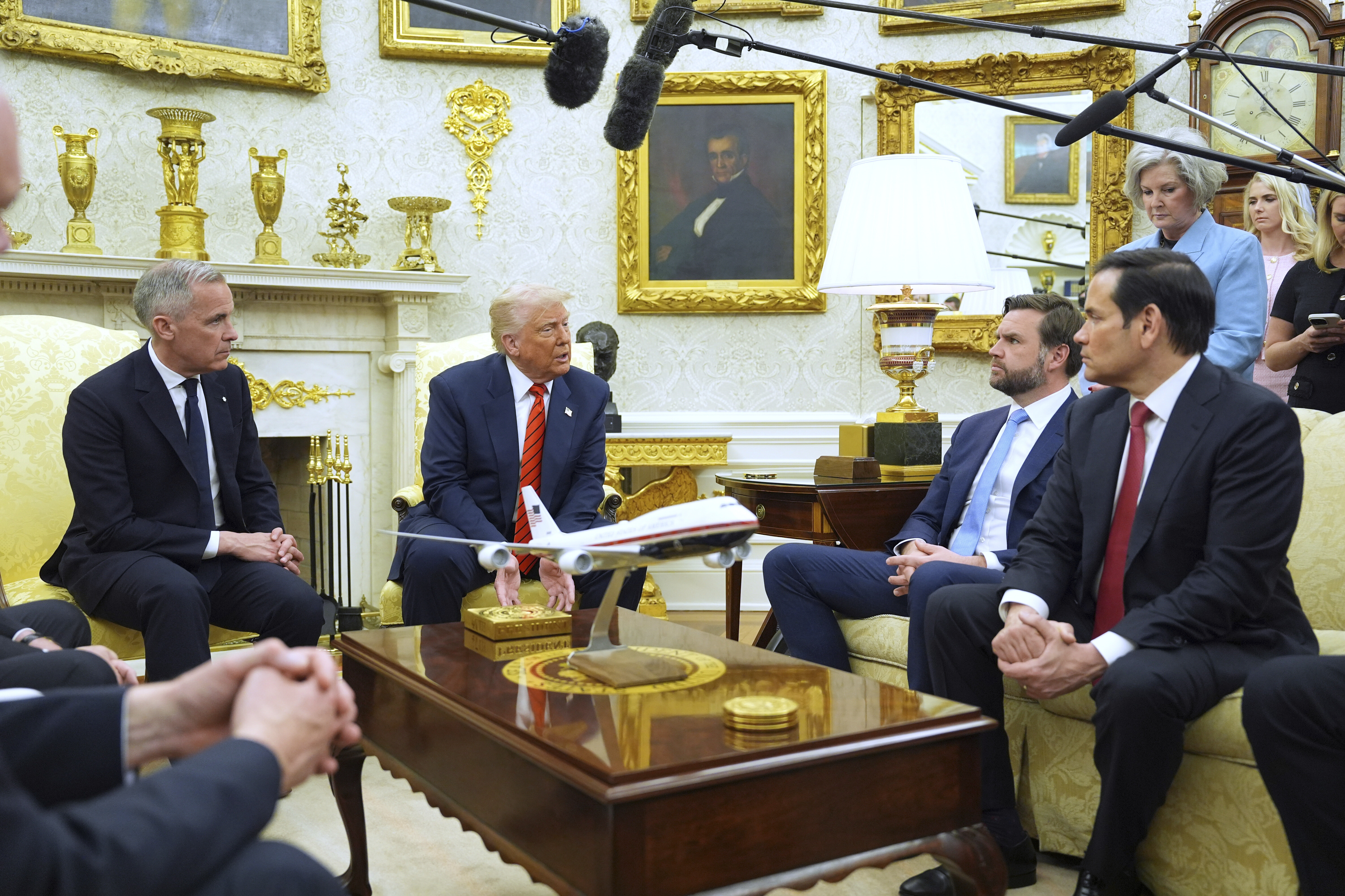President Donald Trump meets Canadian Prime Minister Mark Carney in the Oval Office of the White House, Tuesday, May 6, 2025, in Washington. (AP Photo/Evan Vucci)