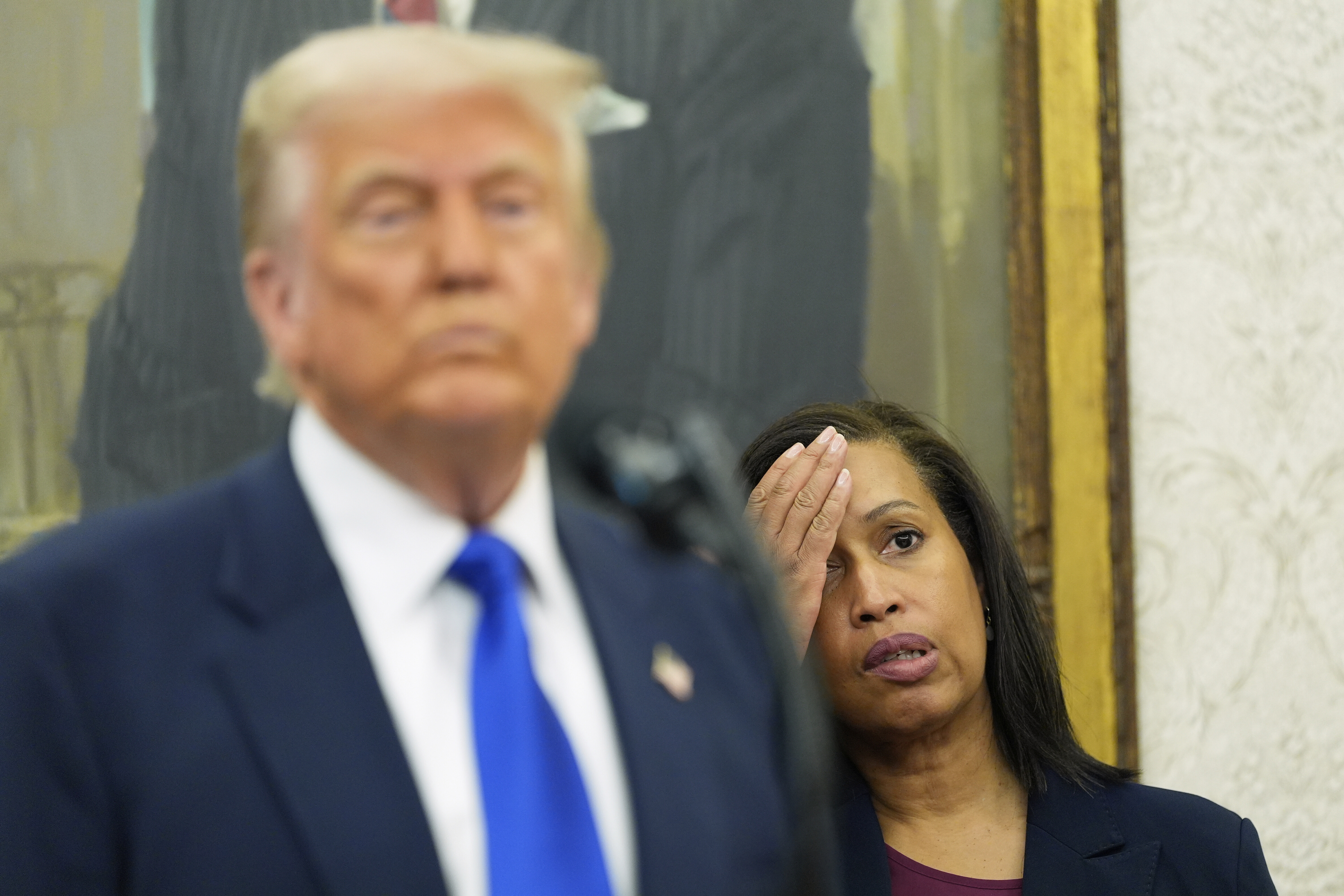 District of Columbia Mayor Muriel Bowser listens as President Donald Trump speaks during an event to announce that the 2027 NFL Draft will be held on the National Mall, in the Oval Office of the White House, Monday, May 5, 2025, in Washington. (AP Photo/Alex Brandon)