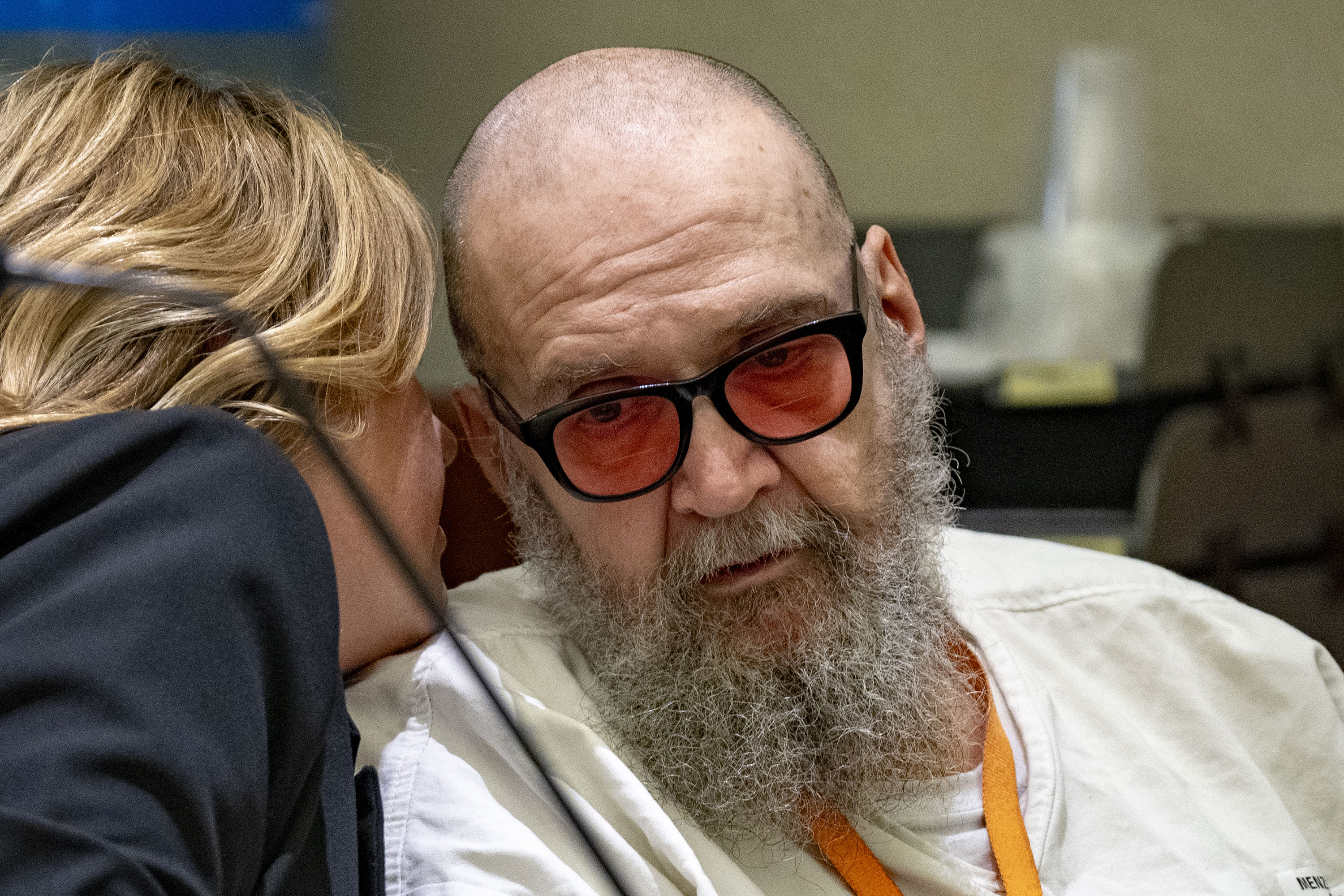 Jasmine North, Federal Public Defender Mitigation Investigator, speaks with Ralph Leroy Menzies, during his competency hearing in Third District Court in West Jordan, on Monday, Nov 18, 2024. (Rick Egan//The Salt Lake Tribune via AP, Pool)