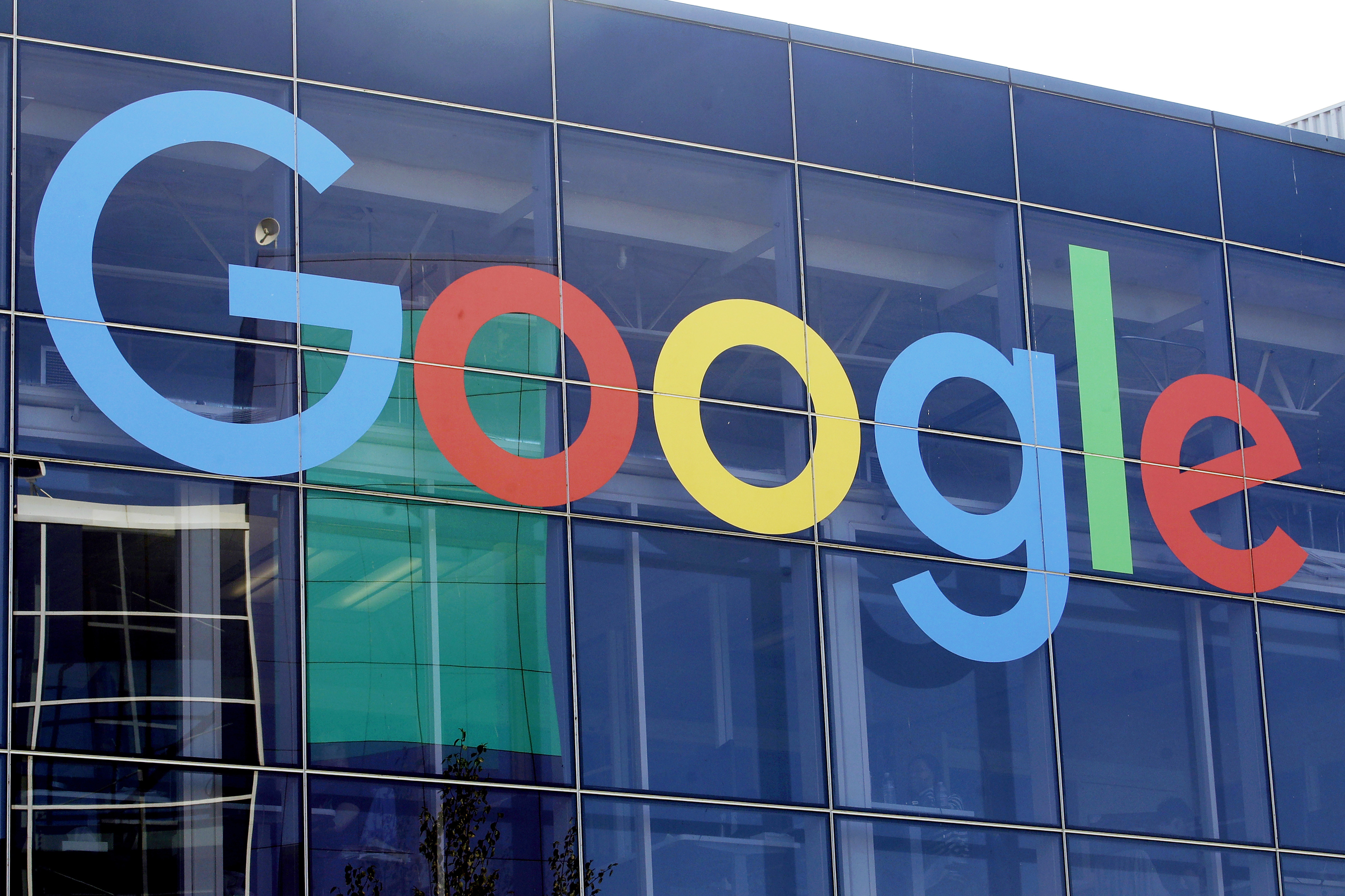 FILE - A sign is displayed on a Google building at their campus in Mountain View, Calif., on Sept. 24, 2019. (AP Photo/Jeff Chiu, File)