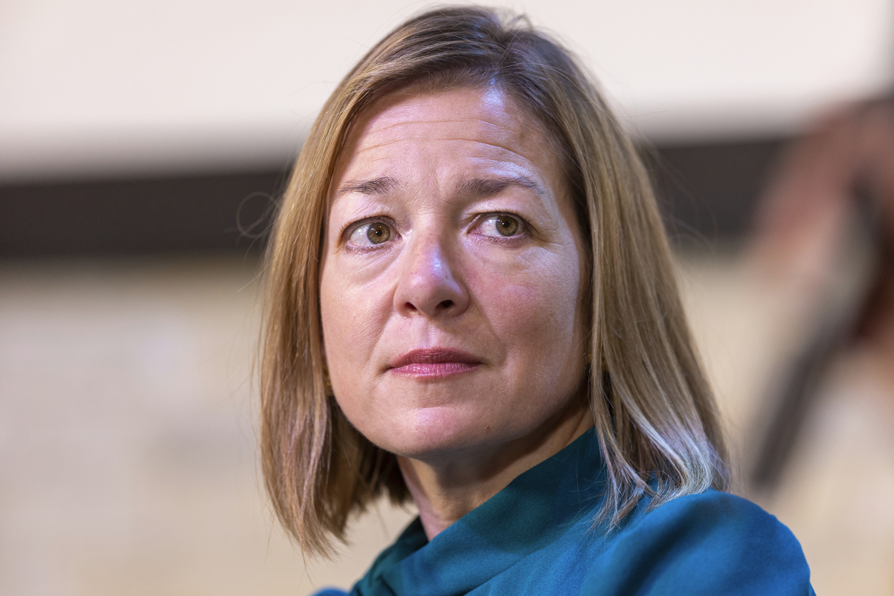 FILE - Lauren McLean, Mayor, City of Boise listens during a news conference at the Linen Building in Boise, Idaho, June 26, 2024. (AP Photo/Kyle Green, file)