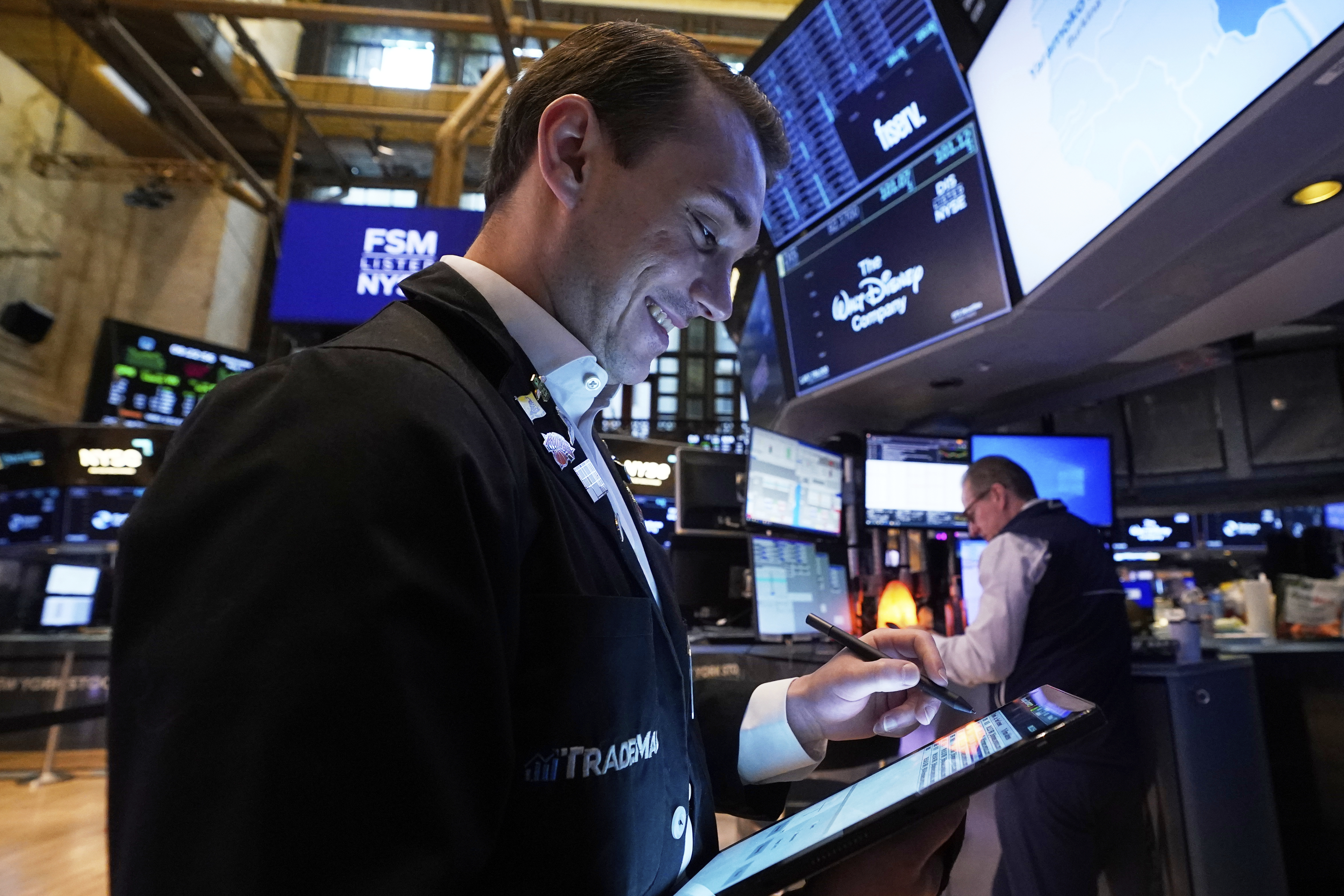 Trader Dylan Halvorsan works on the floor of the New York Stock Exchange, Wednesday, May 7, 2025. (AP Photo/Richard Drew)