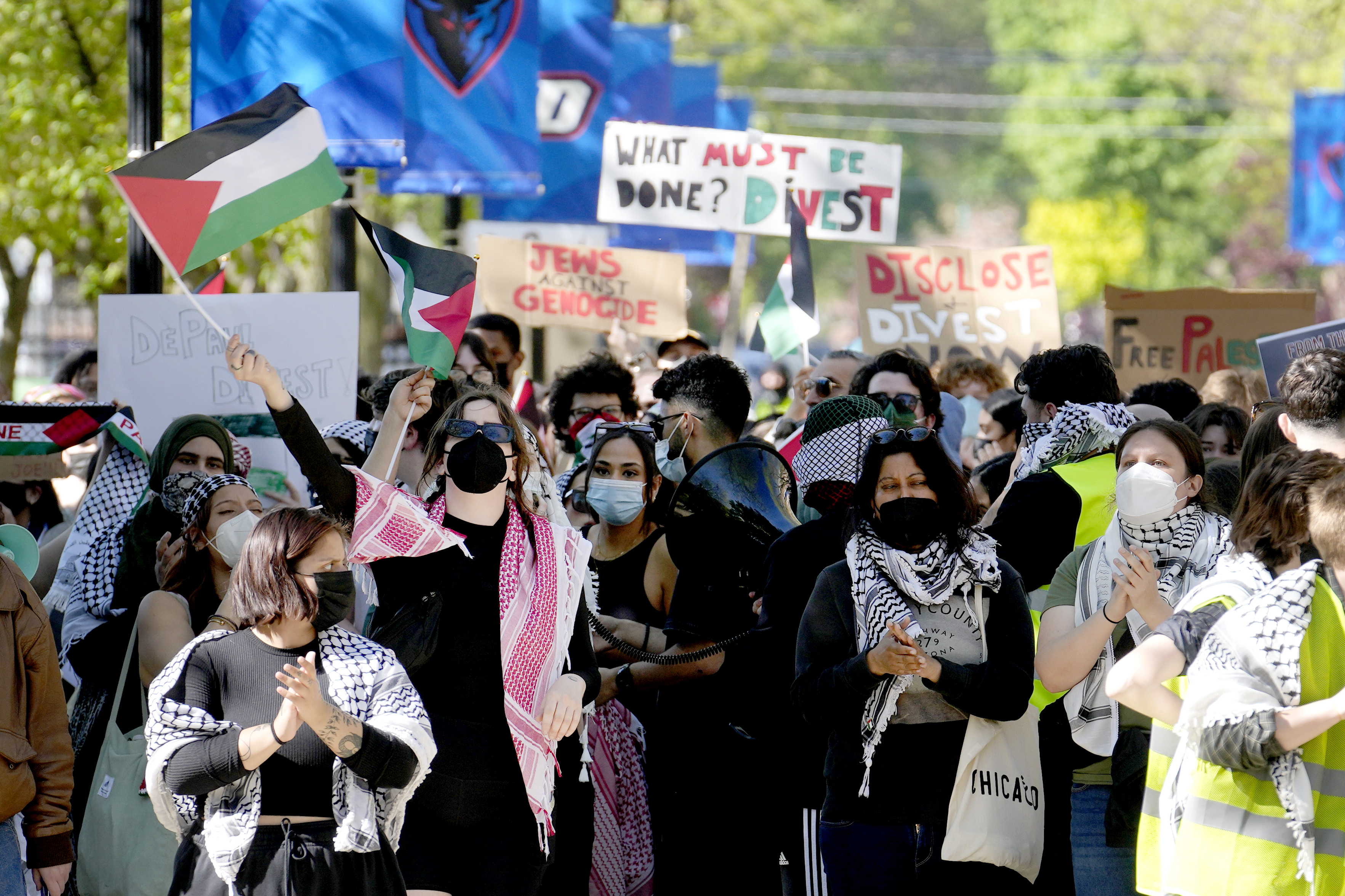 FILE- Pro-Palestinian protesters demonstrate on the campus of DePaul University, April 30, 2024, in Chicago. (AP Photo/Charles Rex Arbogast, file)