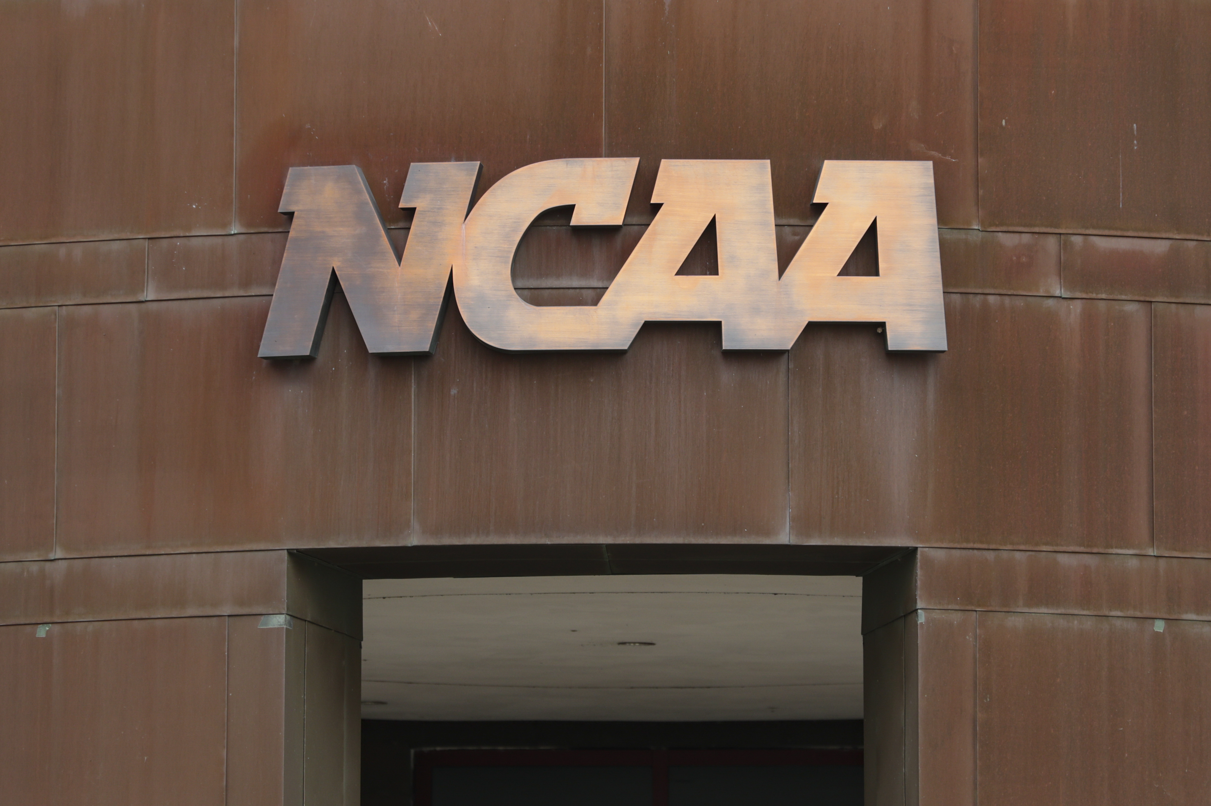 FILE - The nation office of the NCAA is shown in Indianapolis on March 12, 2020. (AP Photo/Michael Conroy, File)