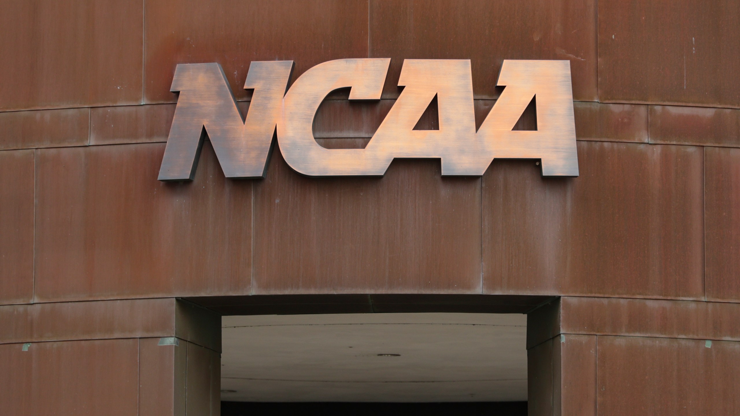 FILE - The nation office of the NCAA is shown in Indianapolis on March 12, 2020. (AP Photo/Michael Conroy, File)
