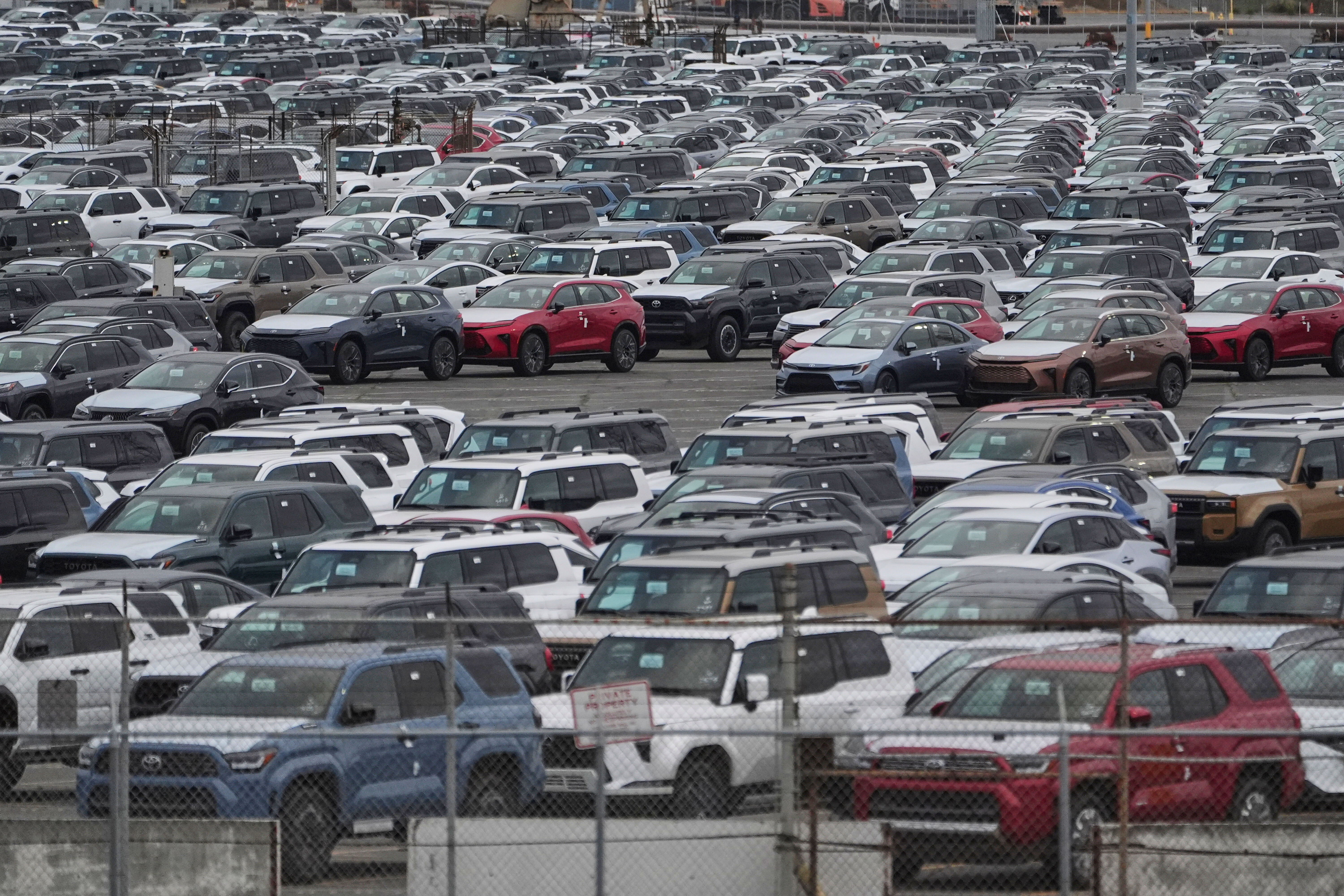 FILE - New Toyota vehicles are stored at the Toyota Logistics Service Inc., their most significant vehicle imports processing facility in North America, at the Port of Long Beach in Long Beach, Calif., Wednesday, March 26, 2025. (AP Photo/Damian Dovarganes)