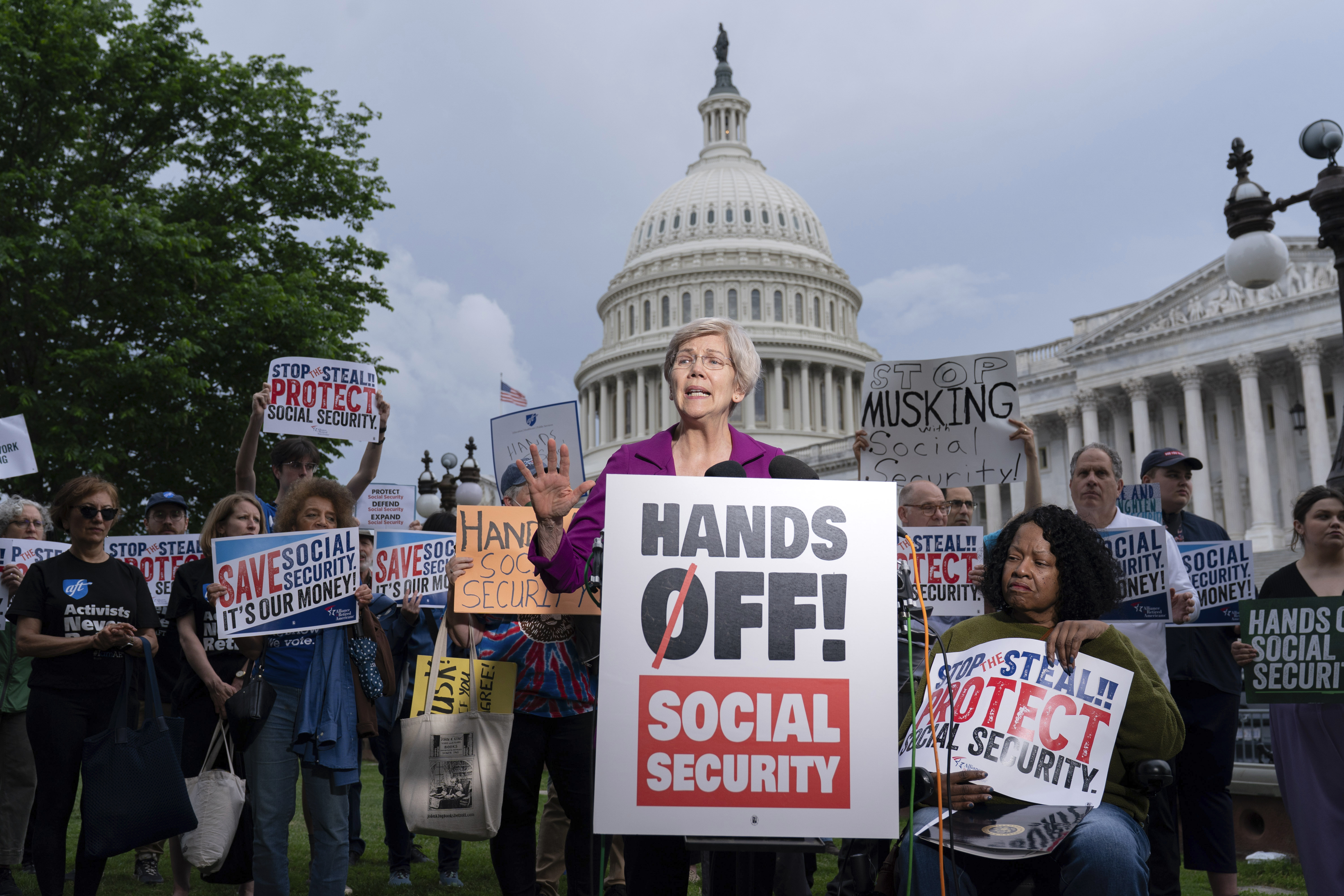 Sen. Elizabeth Warren, D-Mass., speaks during "Hands Off Social Security " rally on Capitol Hill in Washington, Monday, May 5, 2025. (AP Photo/Jose Luis Magana)
