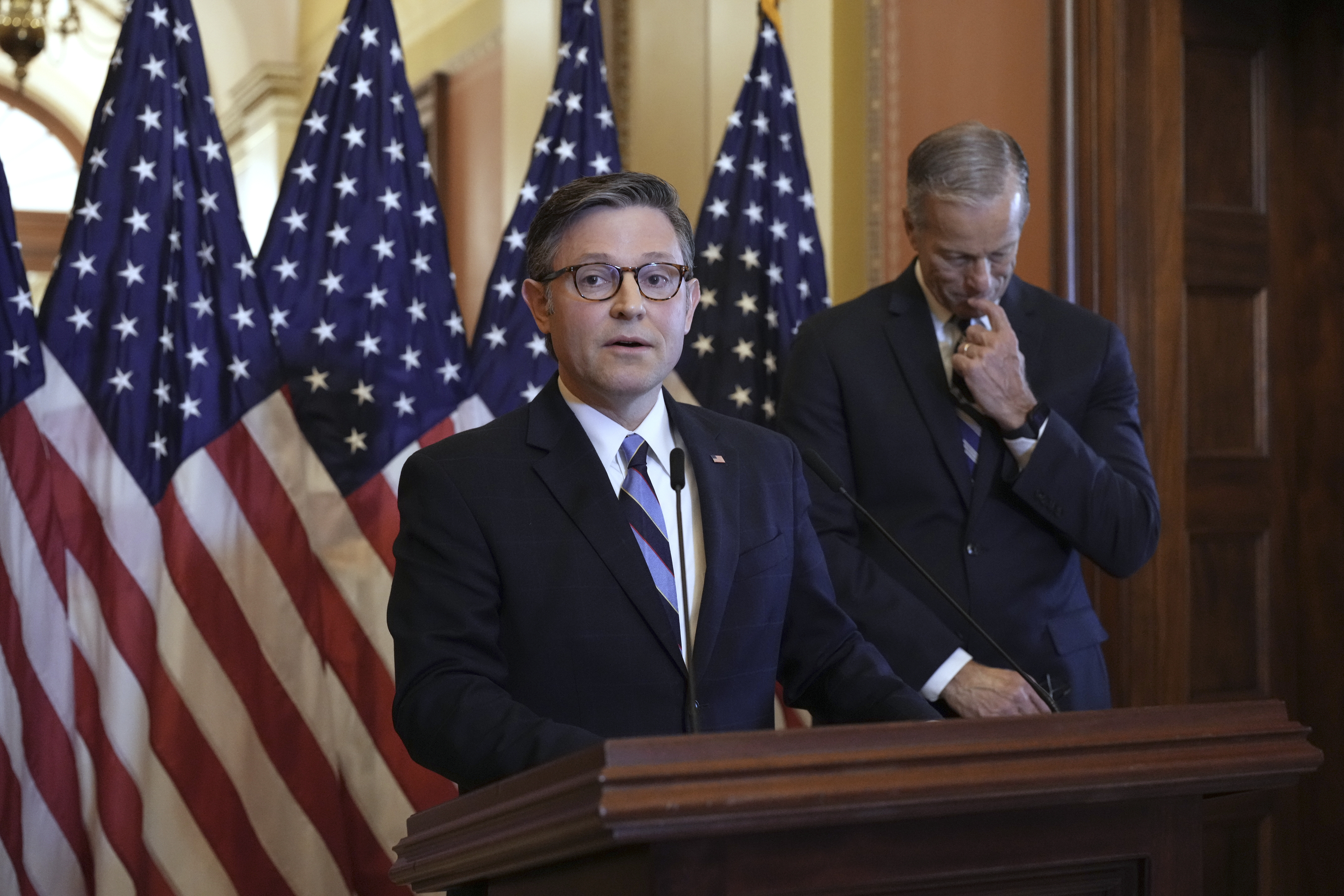 Speaker of the House Mike Johnson, R-La., left, and Senate Majority Leader John Thune, R-S.D., make statements to reporters ahead of vote in the House to pass a bill on President Donald Trump's top domestic priorities of spending reductions and tax breaks, at the Capitol in Washington, Thursday, April 10, 2025. (AP Photo/J. Scott Applewhite)