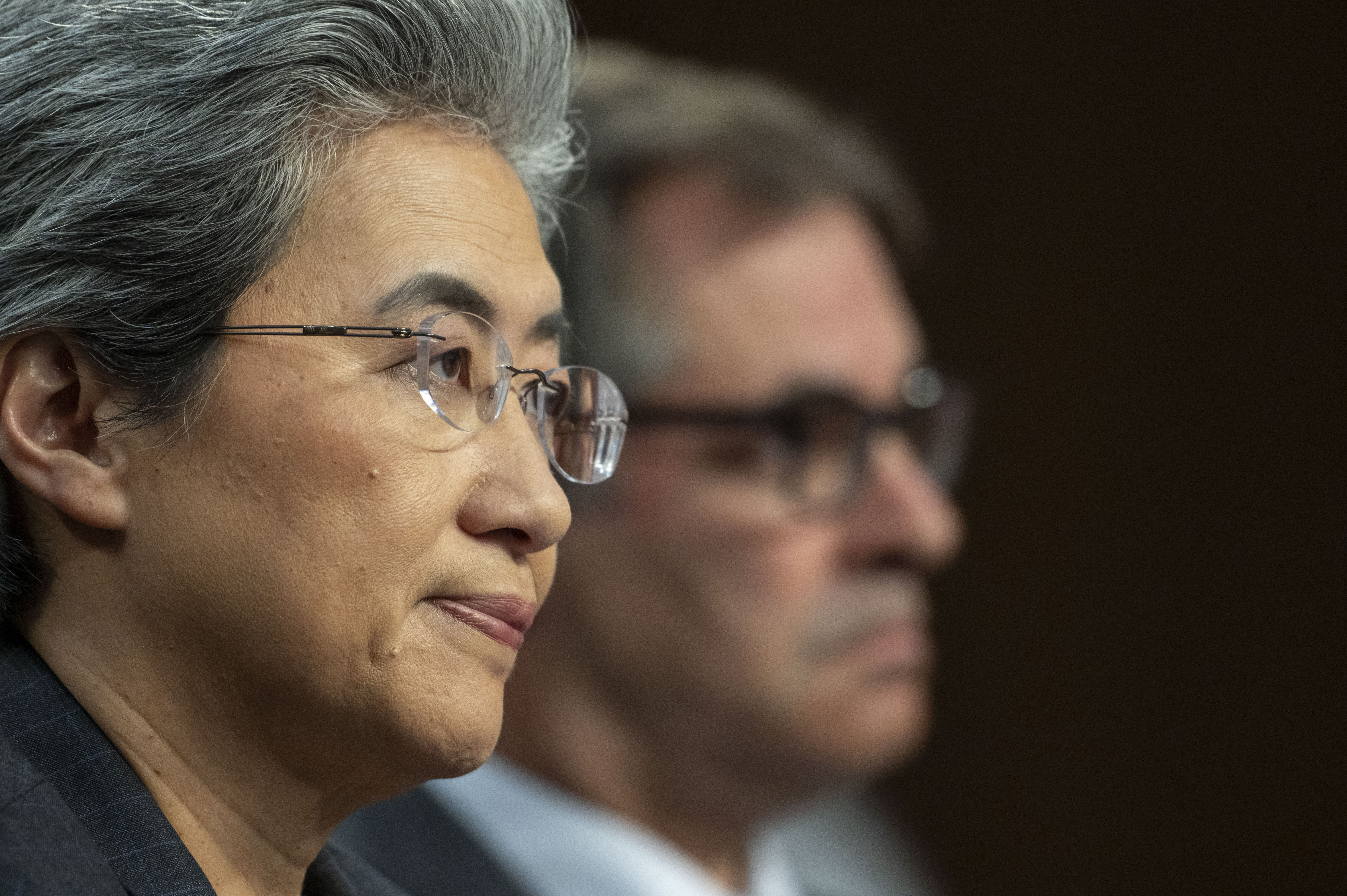 Dr. Lisa Su, chief executive officer and chair, Advanced Micro Devices (AMD), left, and Michael Intrator, co-founder and chief executive officer, CoreWeave, take part in a hearing before the Senate Committee on Commerce, Science, and Transportation, Thursday, May 8, 2025, in Washington. (AP Photo/Kevin Wolf)