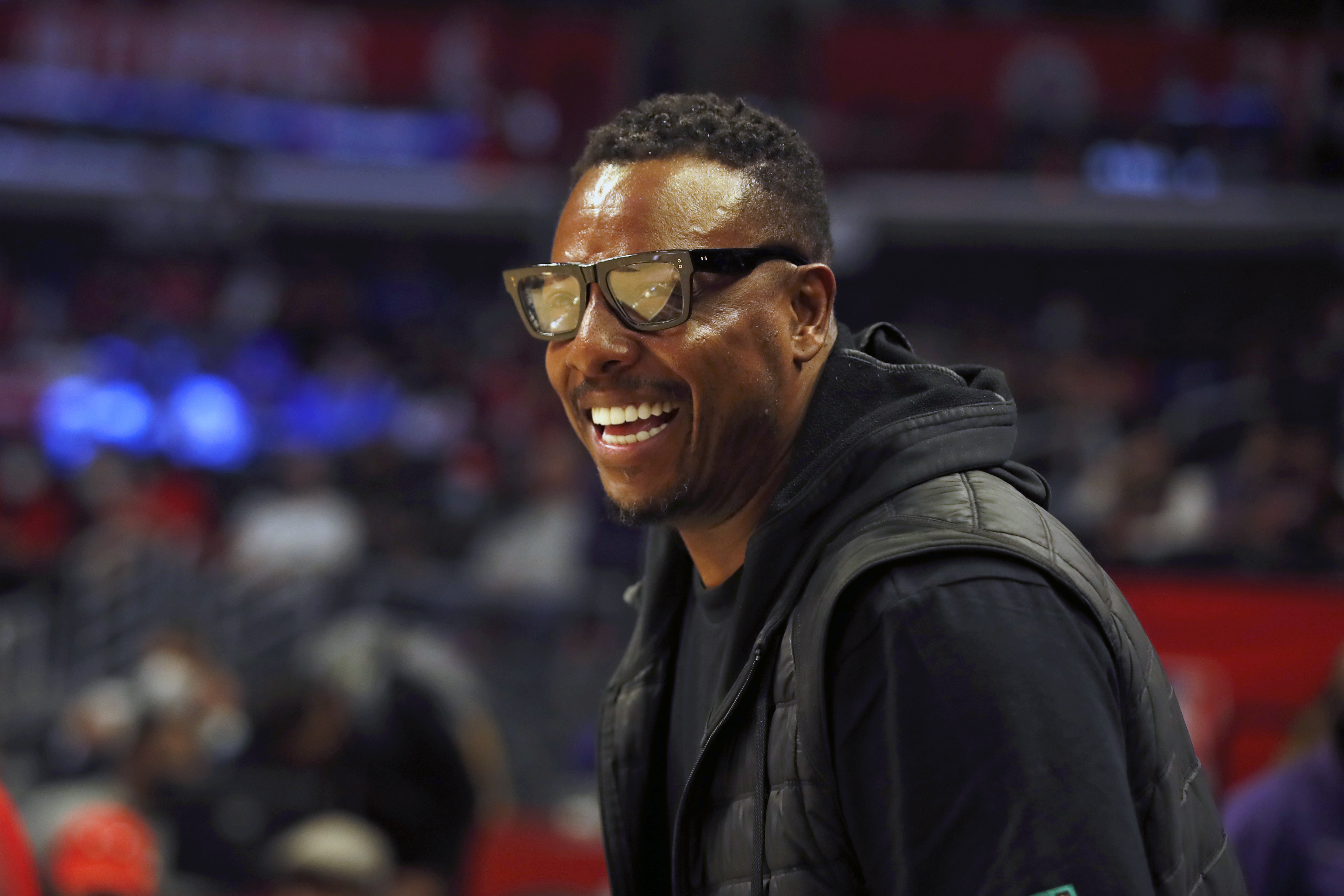 FILE - Former NBA basketball player Paul Pierce smiles watching warmups before an NBA basketball game between the Los Angeles Clippers and the Chicago Bulls, Nov. 14, 2021, in Los Angeles. (AP Photo/Alex Gallardo, file)