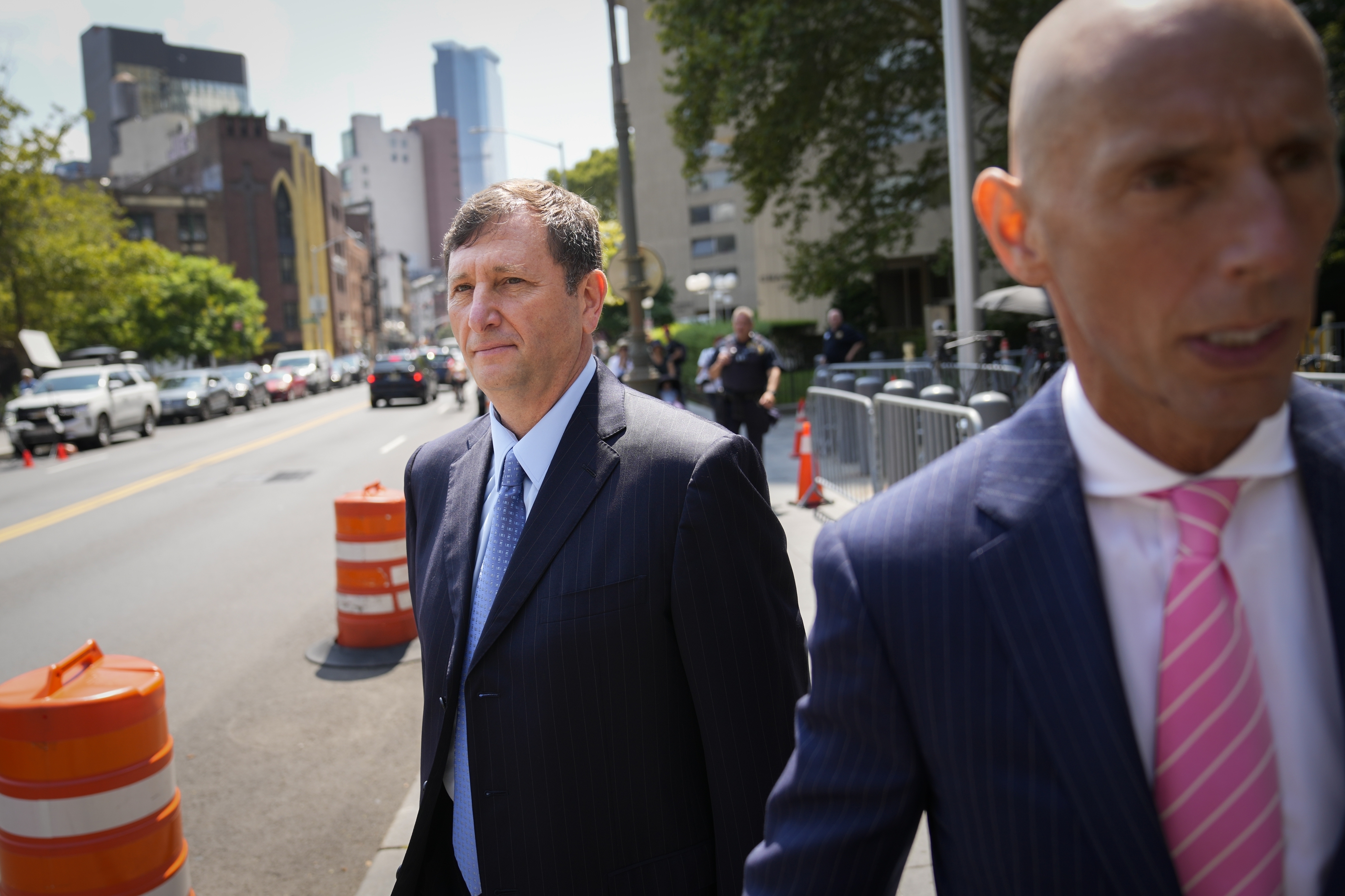FILE - Alexander Mashinsky, founder and former chief executive of the failed cryptocurrency lending platform Celsius Network, leaves Manhattan federal court with his legal team, Tuesday, July 25, 2023, in New York. (AP Photo/John Minchillo, File)