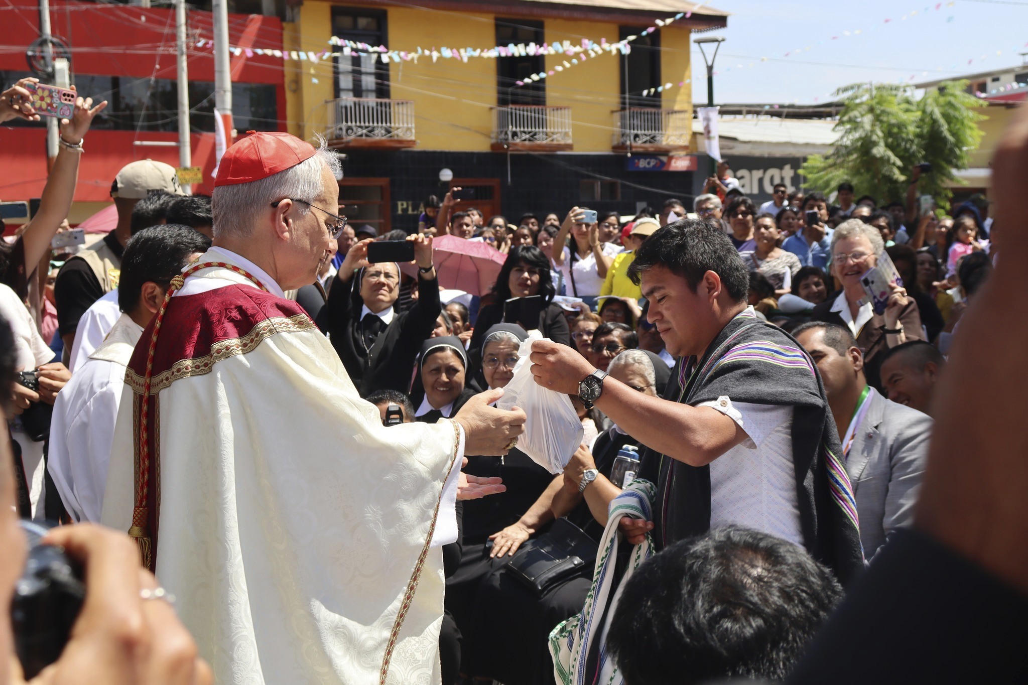 In this photo released by the Diocese of Chulucanas, Bishop Robert Prevost leads the celebration anniversary of the Diocese in Chulucanas, Peru, Aug. 12, 2024. (Diocese of Chulucanas via AP)