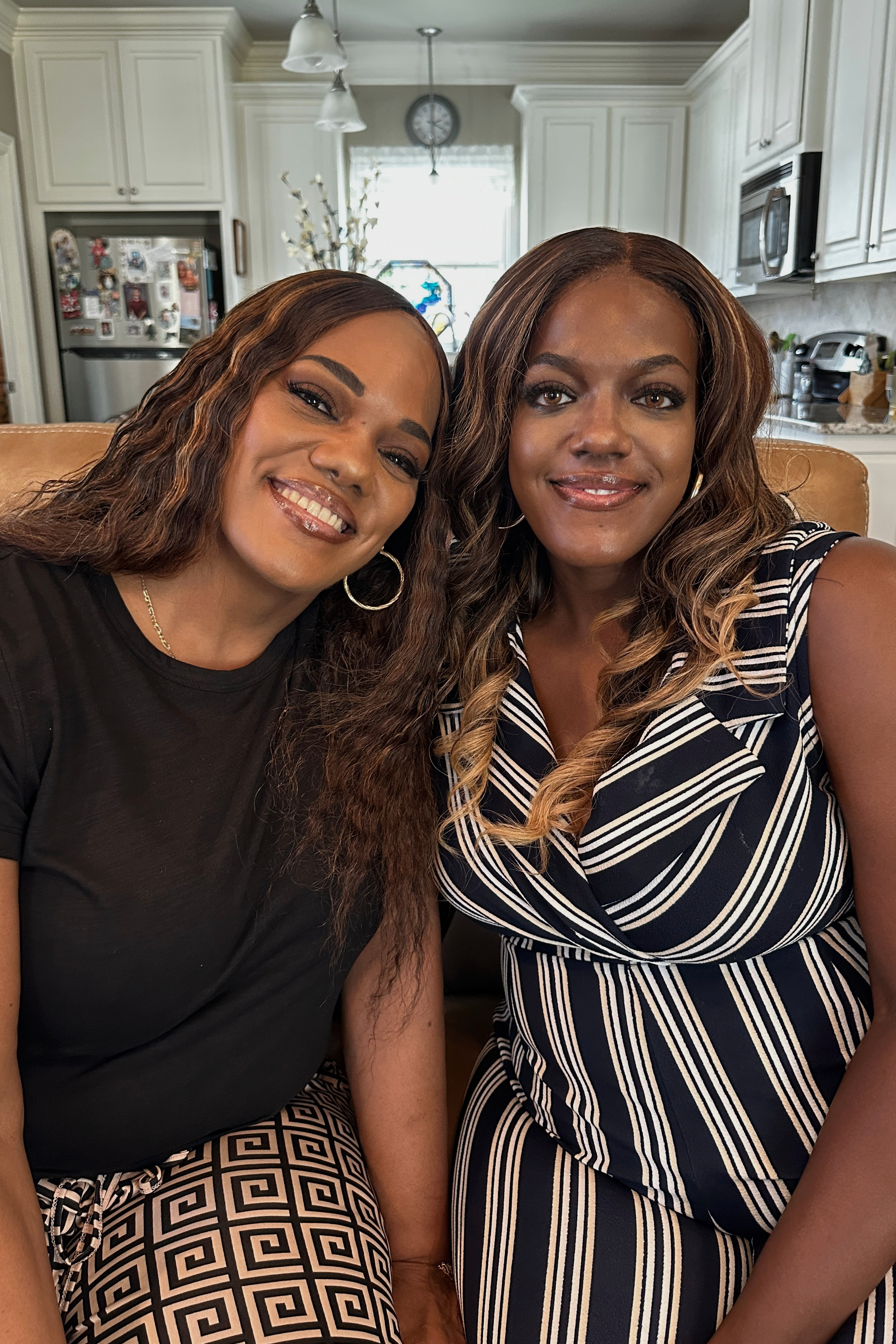 Kidney donor Nija Butler and kidney recipient Ambrealle Brown are photographed the day before graduating from Baton Rouge General's School of Nursing on April 28, 2025 in central Louisiana. (AP Photo/Stephen Smith)