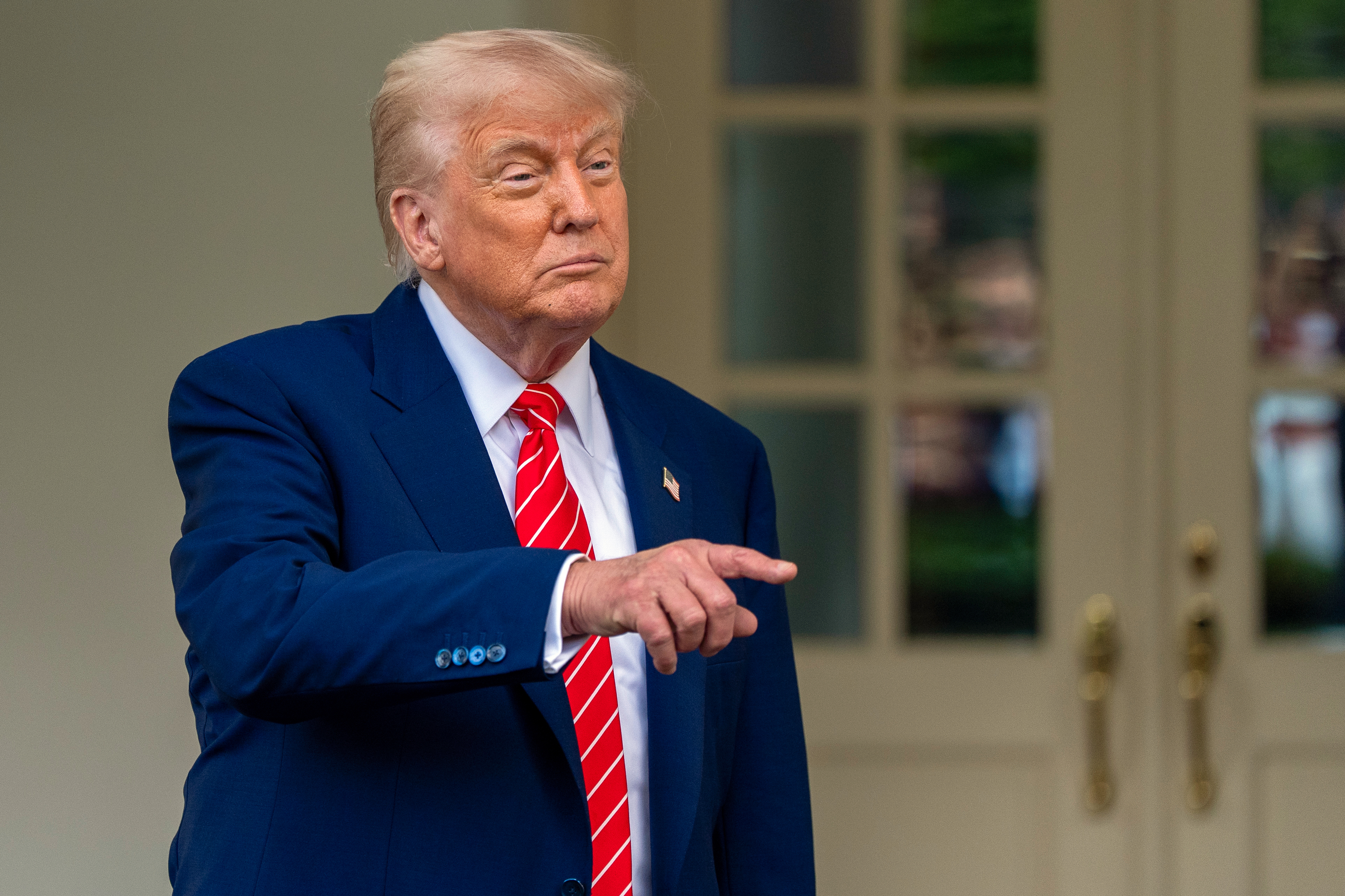 President Donald Trump speaks with reporters in front of the West Wing of the White House, Thursday, May 8, 2025, in Washington. (AP Photo/Alex Brandon)
