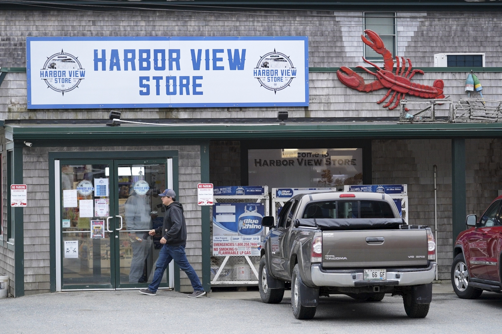 A lobster is part of the decorations at the Harbor View store in Stonington, Maine, on Friday, May 2, 2025. (AP Photo/Robert F. Bukaty)