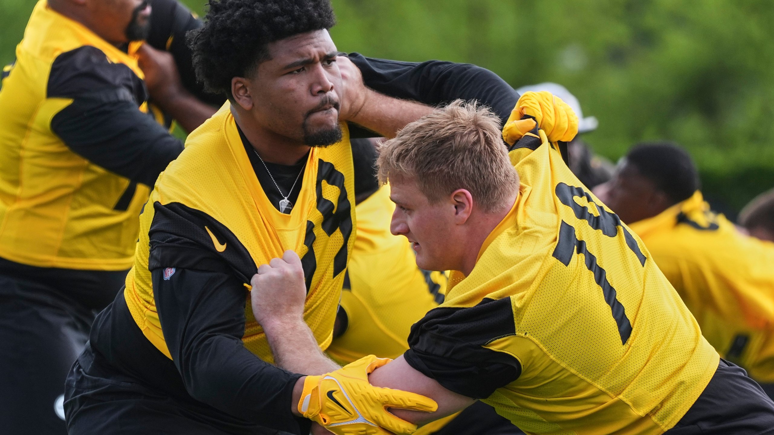 Pittsburgh Steelers first round draft pick Derrick Harmon, left, works against veteran Jacob Slade (79) during the NFL football team's rookie camp in Pittsburgh, Friday, May 9, 2025. (AP Photo/Gene J. Puskar)