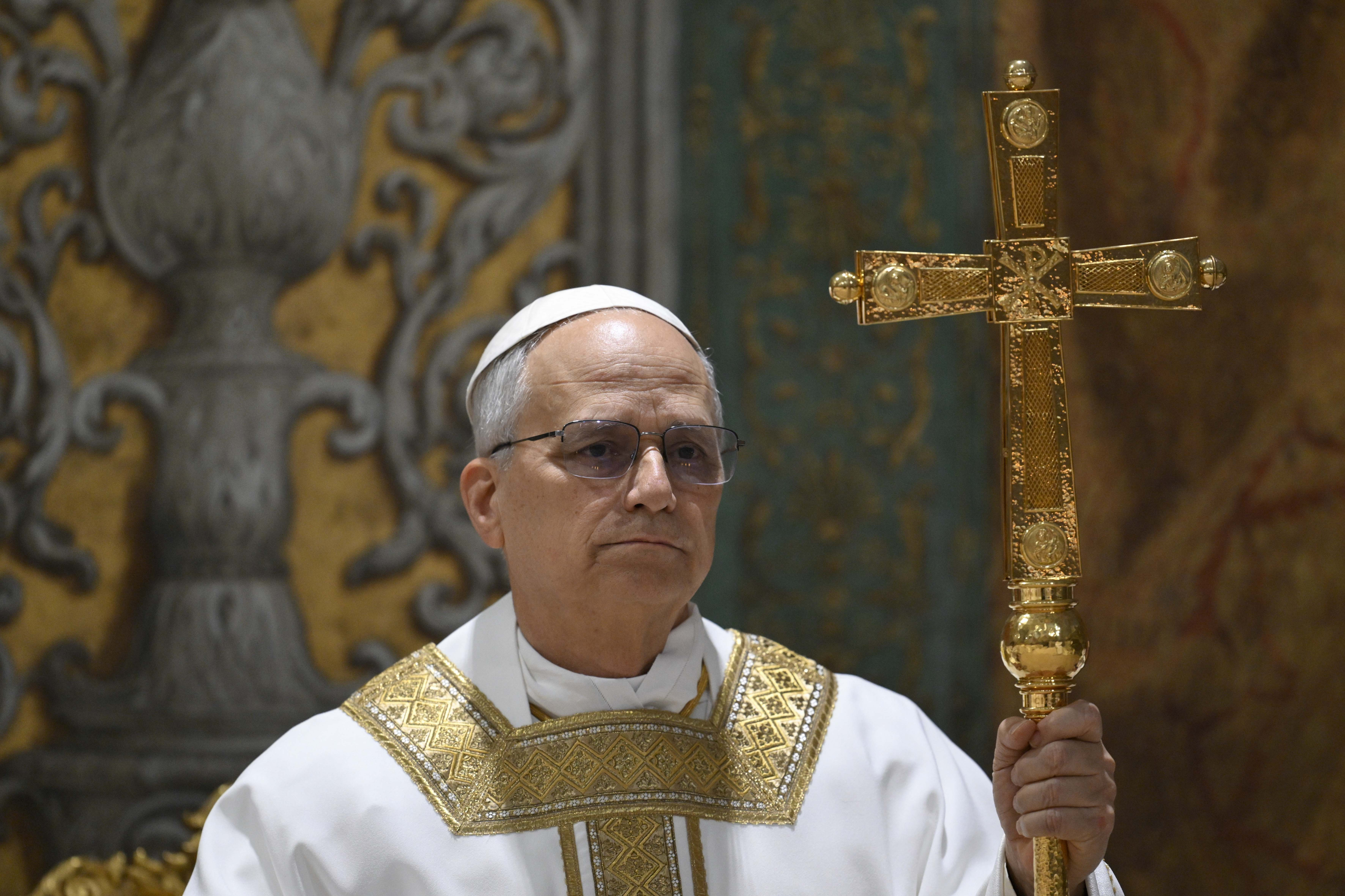 Newly elected Pope Leo XIV concelebrates Mass with the College of Cardinals inside the Sistine Chapel at the Vatican the day after his election as 267th pontiff of the Roman Catholic Church, Friday, May 9, 2025. (Vatican Media via AP)