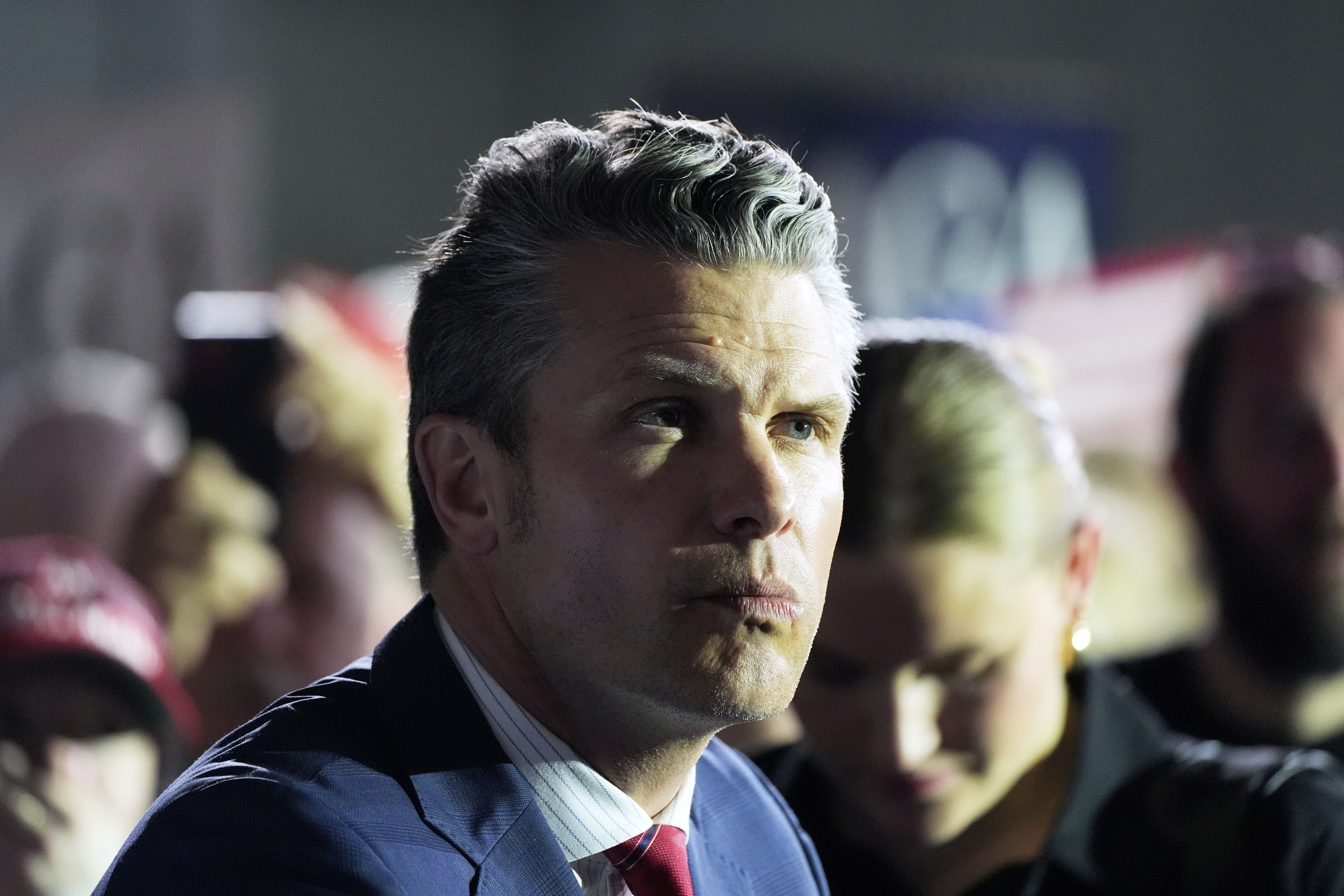Defense Secretary Pete Hegseth arrives before President Donald Trump speaks on his first 100 days at Macomb County Community College Sports Expo Center, Tuesday, April 29, 2025, in Warren, Mich. (AP Photo/Alex Brandon)