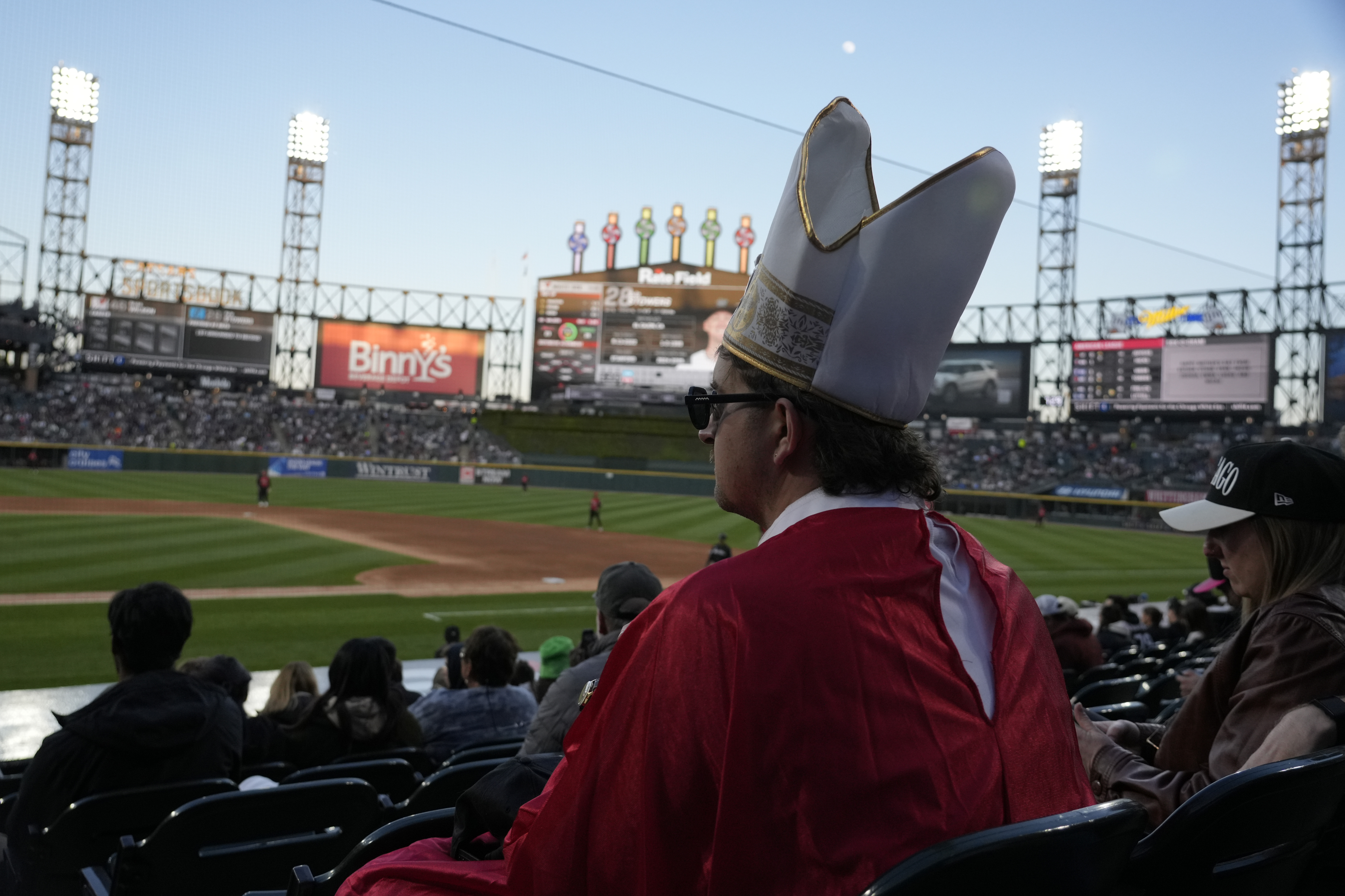 David Hughes of Chicago watches a baseball game between the Chicago White Sox and the Miami Marlins during the fourth inning Friday, May 8, 2025, in Chicago. (AP Photo/David Banks)