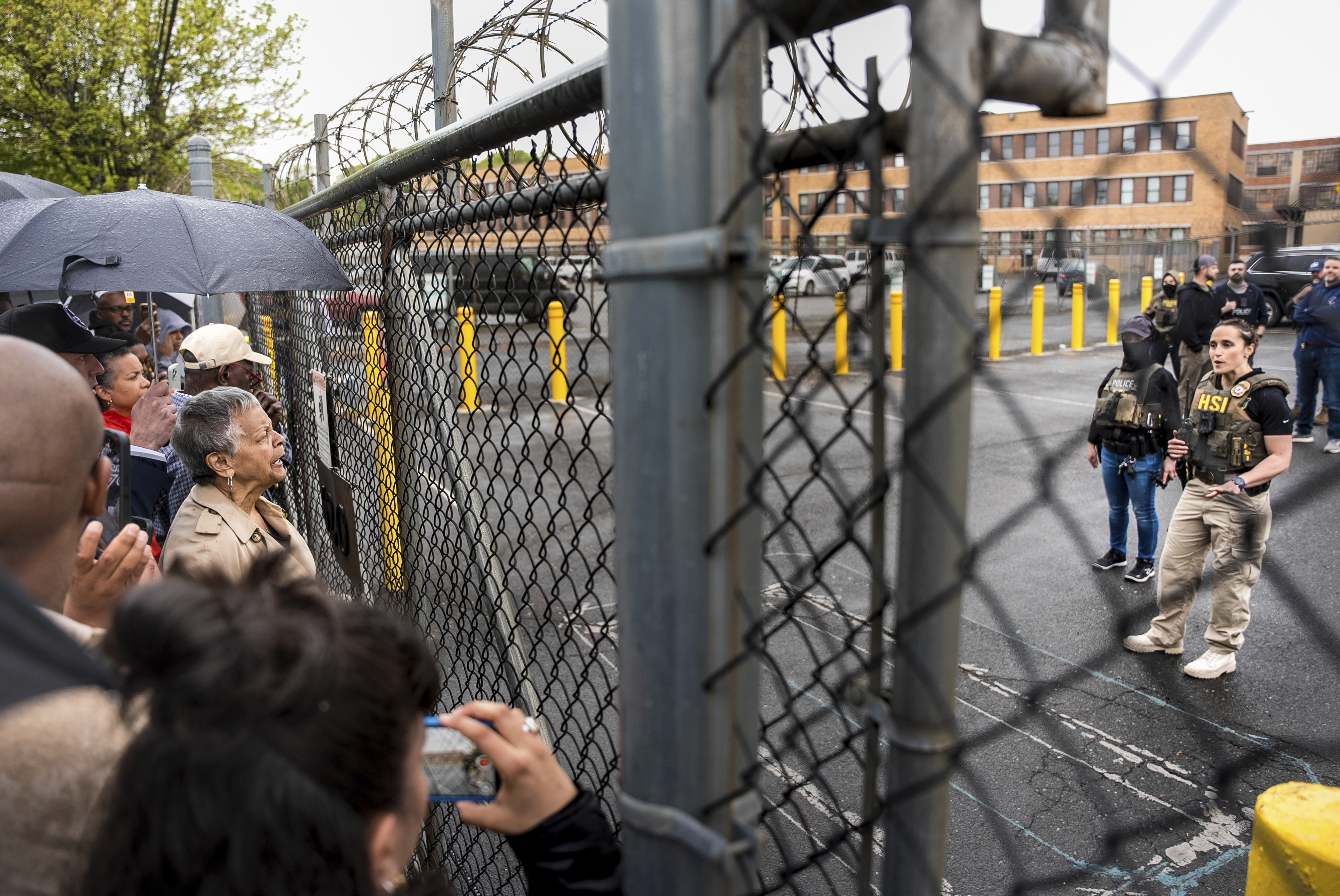 Rep. Bonnie Watson Coleman, D-N.J., speaks with an officer demanding she be let into the ICE Detention office after the arrest of Newark Mayor Ras Baraka, Friday, May 9, 2025, in Newark, N.J. (AP Photo/Angelina Katsanis)