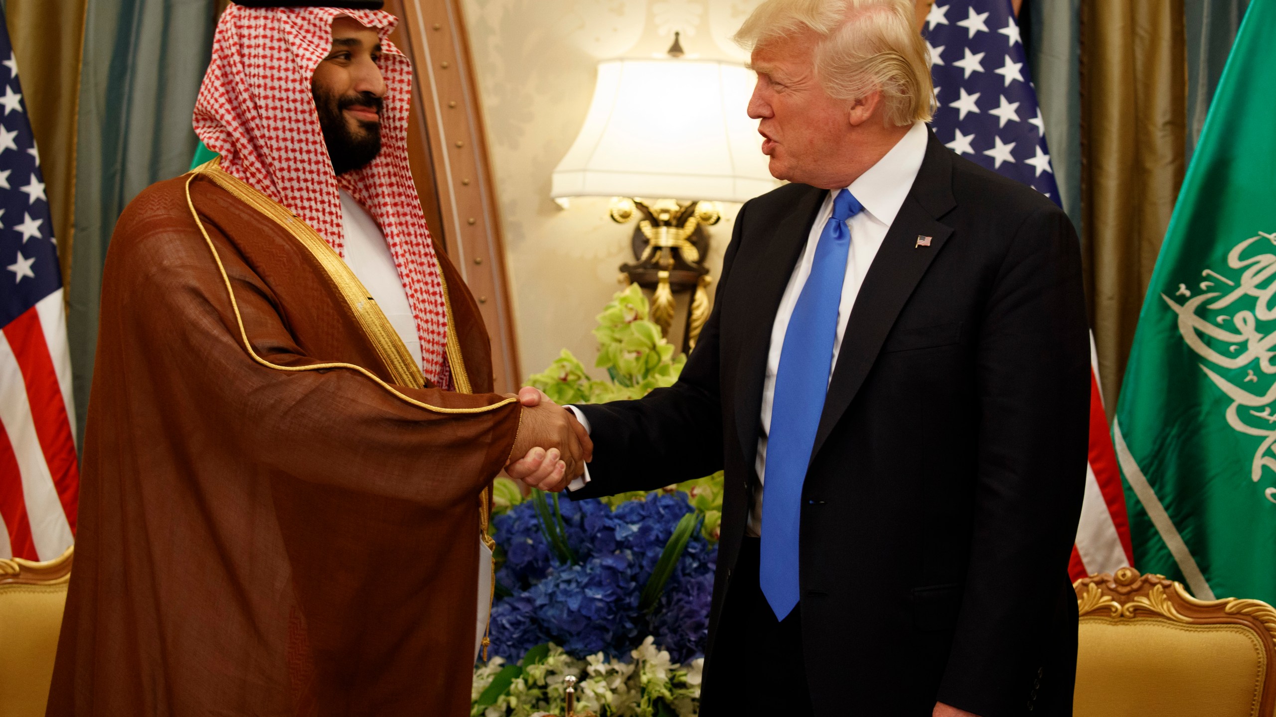 FILE- President Donald Trump, right, shakes hands with Saudi Deputy Crown Prince and Defense Minister Mohammed bin Salman during a bilateral meeting, in Riyadh, May 20, 2017. (AP Photo/Evan Vucci, File)