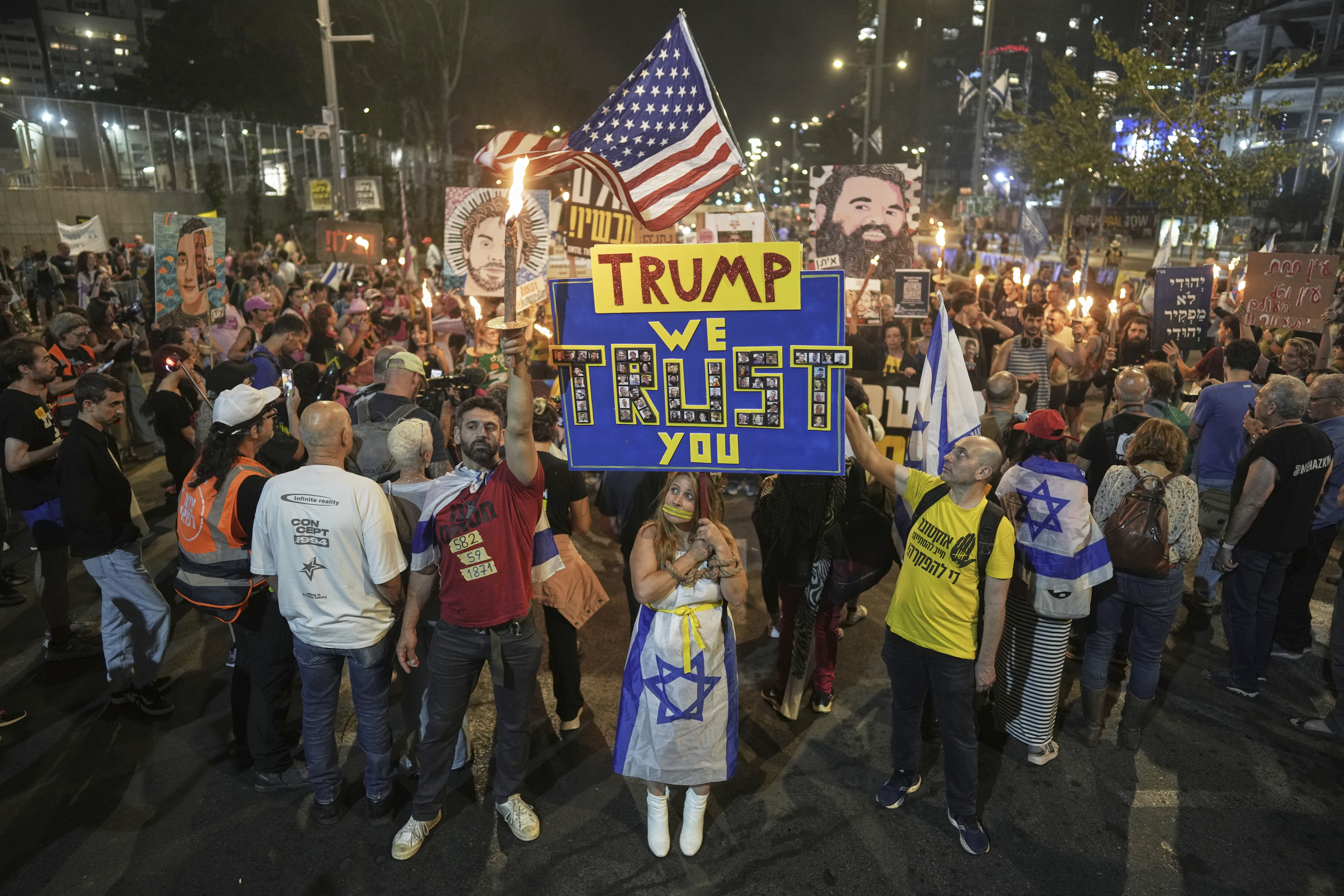 People take part in a protest demanding the immediate release of hostages held by Hamas in the Gaza Strip, in Tel Aviv, Israel, Saturday, May 10, 2025. (AP Photo/Oded Balilty)