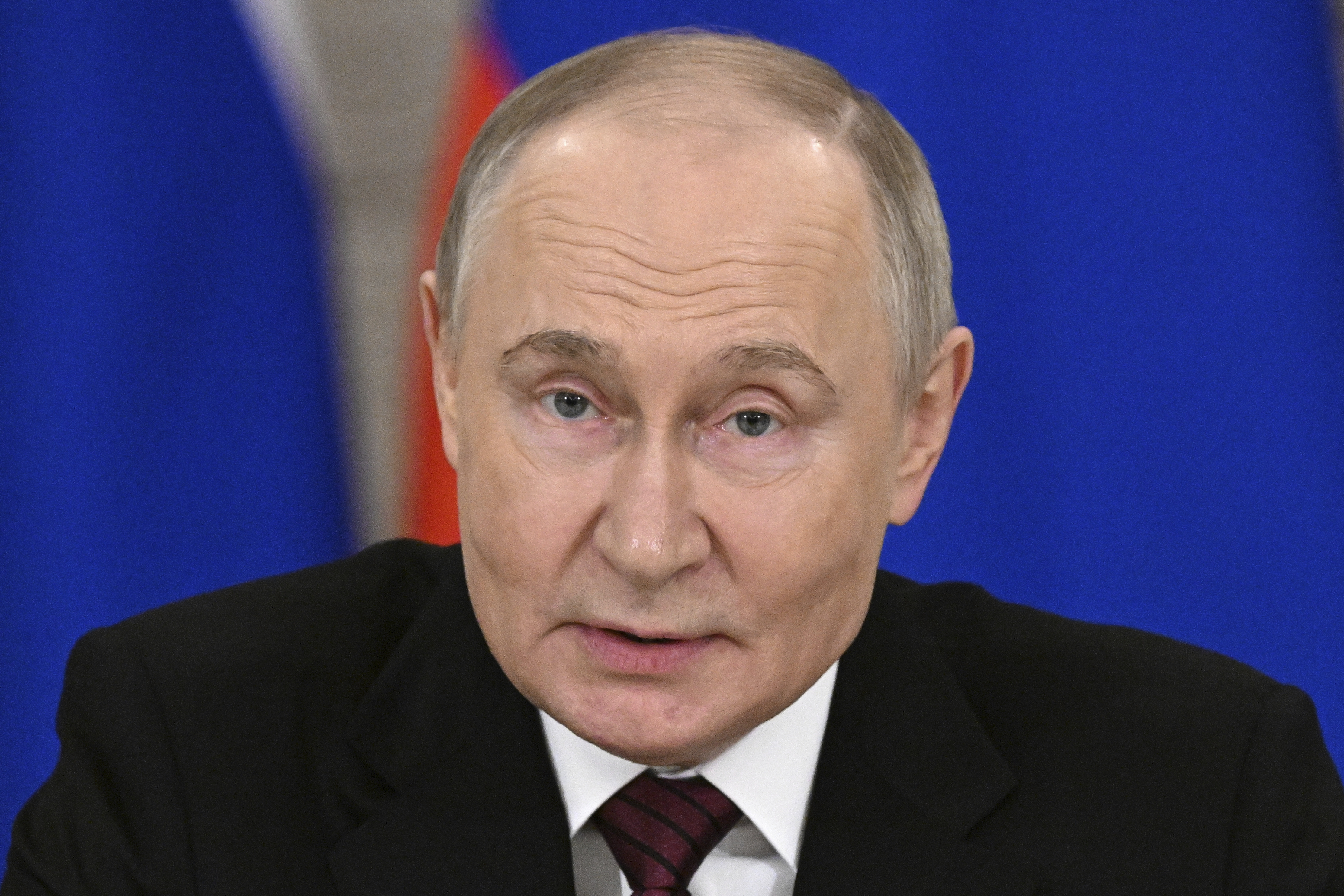 Russian President Vladimir Putin gestures as he speaks to journalists in the Grand Palace at the Kremlin in Moscow, Russia, Sunday, May 11, 2025, after celebrations of the 80th anniversary of the Soviet Union's victory over Nazi Germany during World War II. (Sergei Bobylev/Photo host agency RIA Novosti via AP)