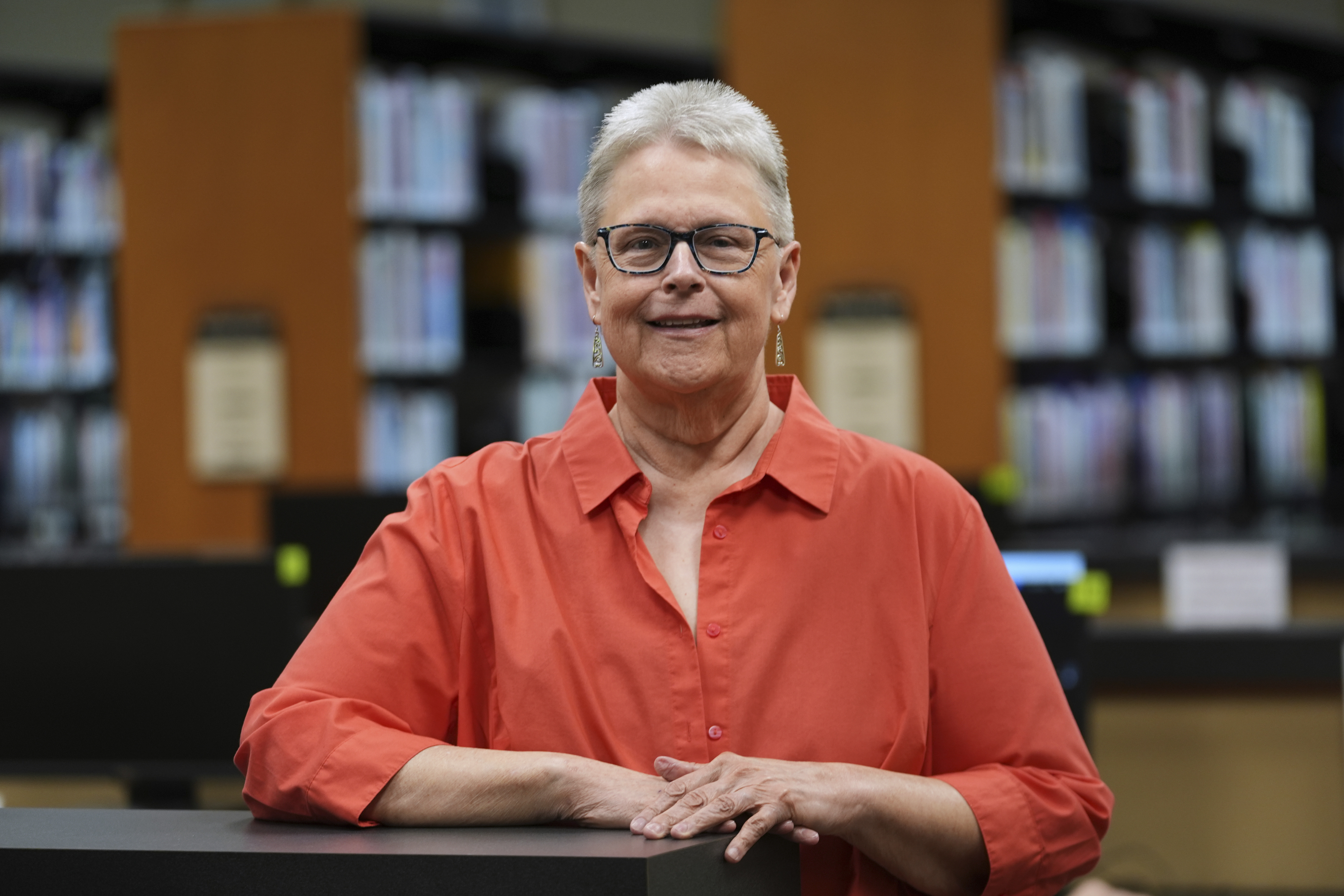 Lisa Brakel poses at the Bedford Branch Library in Temperance, Mich., Tuesday, May 6, 2025. (AP Photo/Paul Sancya)