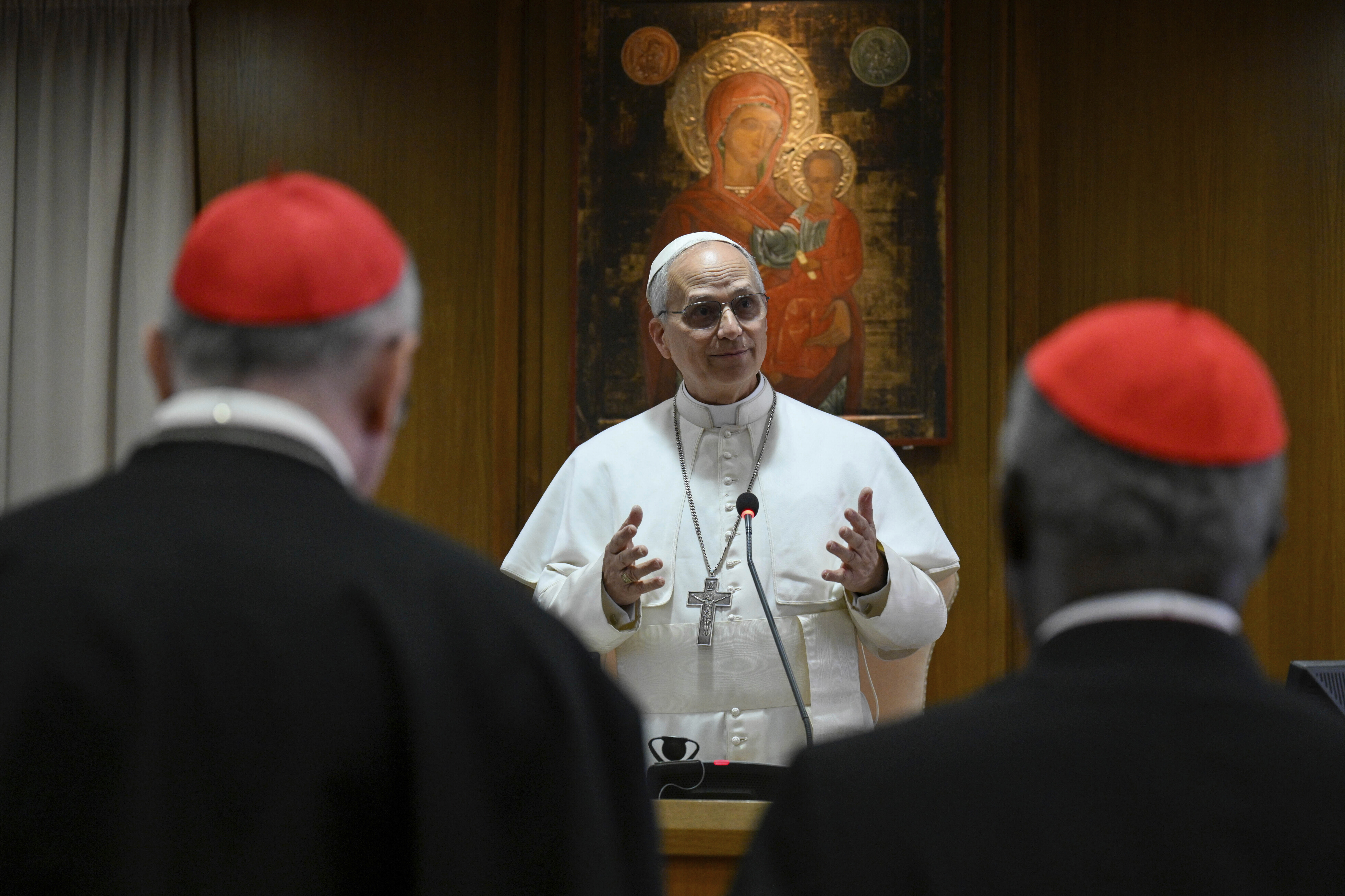 Pope Leo XIV meets the College of Cardinals in the New Synod Hall at the Vatican, Saturday, May 10, 2025. (Vatican Media via AP)