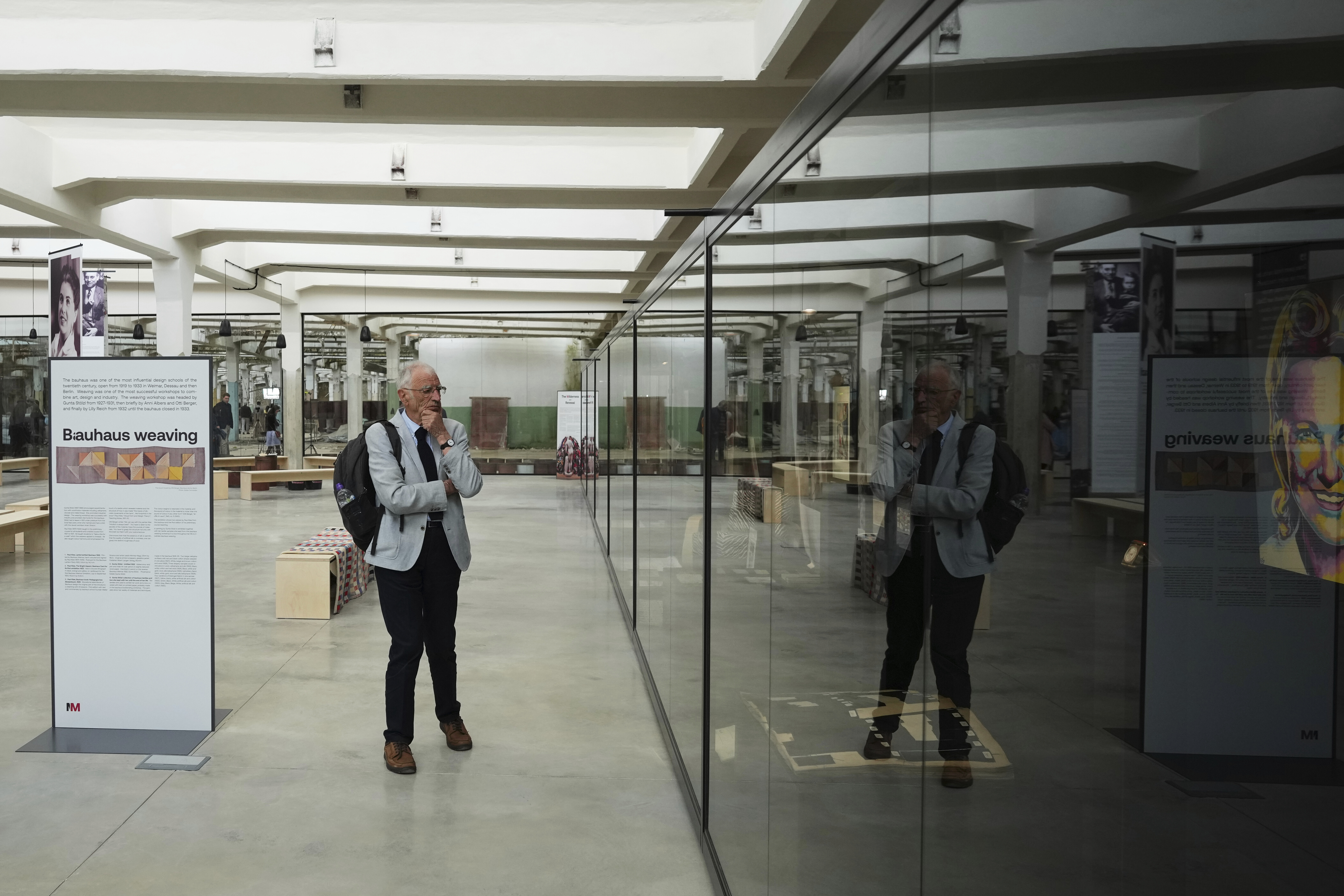 A visitor observes the Museum of Survivors, located in a factory where Oskar Schindler saved some 1200 Jews during the WWII, in Brnenec, Czech Republic, Saturday, May 10, 2025. (AP Photo/Petr David Josek)