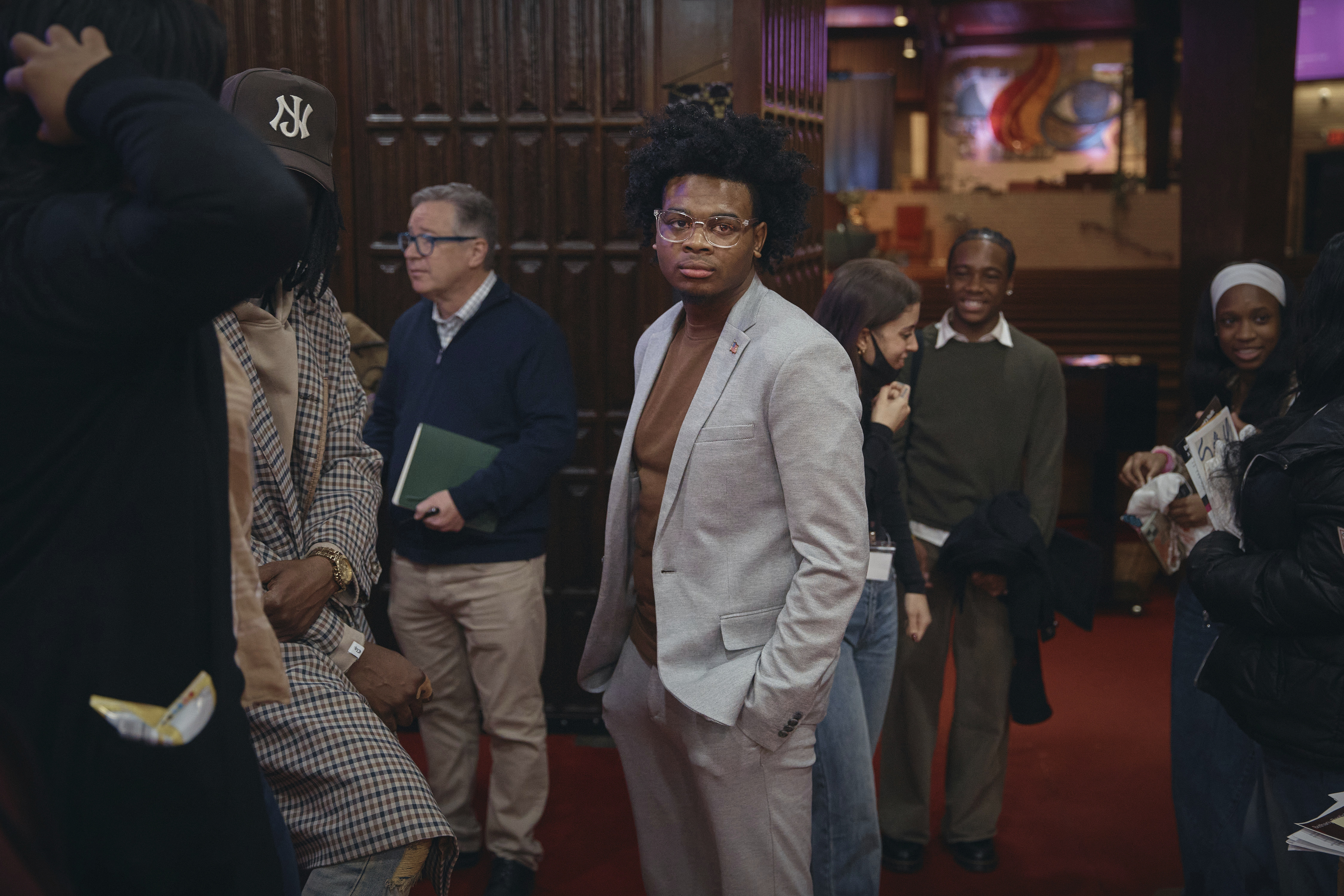 Young Voters Association President, Nathan Duguid, 19, center, stands during a Town Hall and voter registration for school board elections at the Bethany Baptist Church, Saturday, Feb. 1, 2025, in Newark, N.J. (AP Photo/Andres Kudacki)