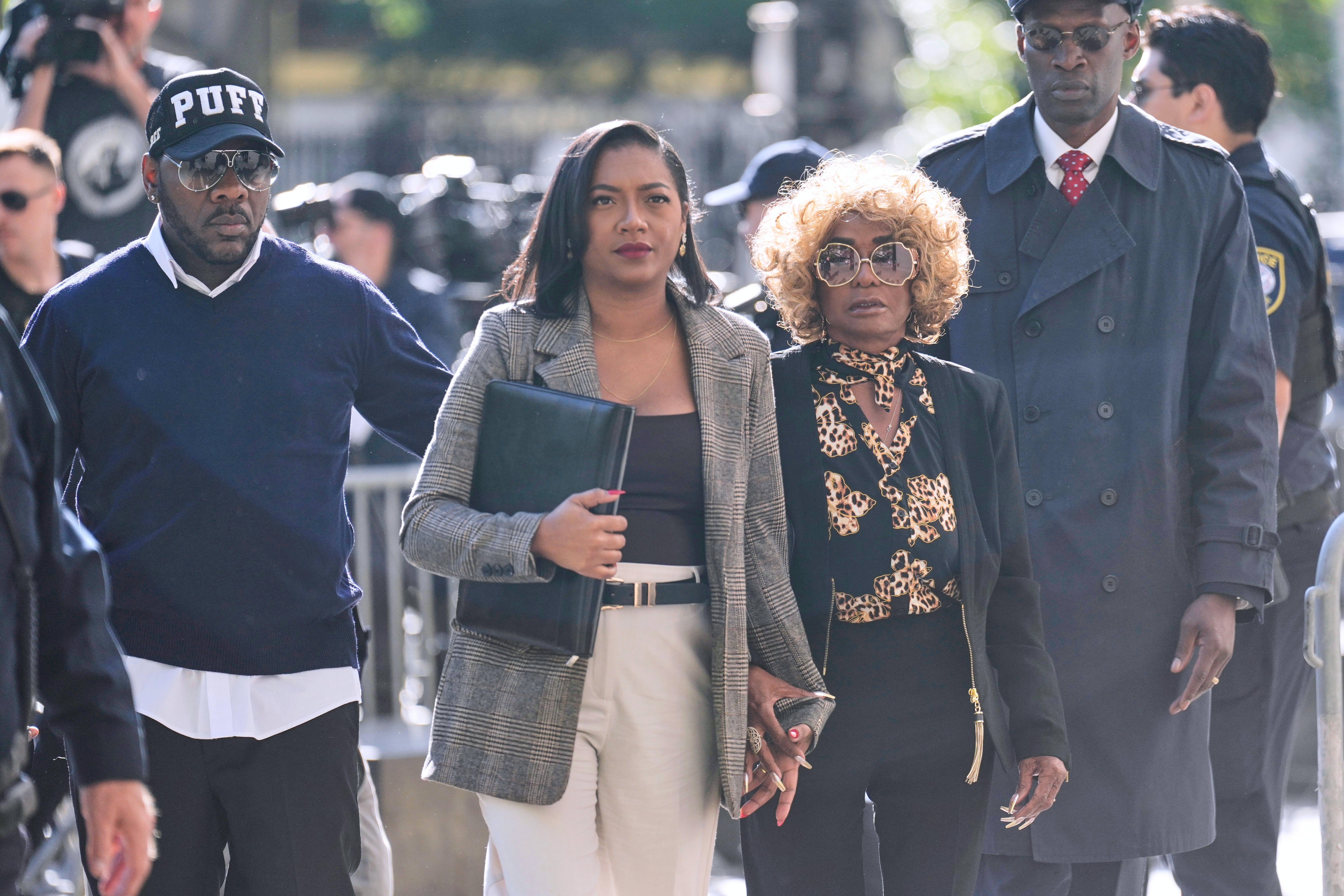 Janice Combs, mother of Sean "Diddy" Combs, second from right, arrives to the courthouse in New York, Monday, May 12, 2025. (AP Photo/Seth Wenig)