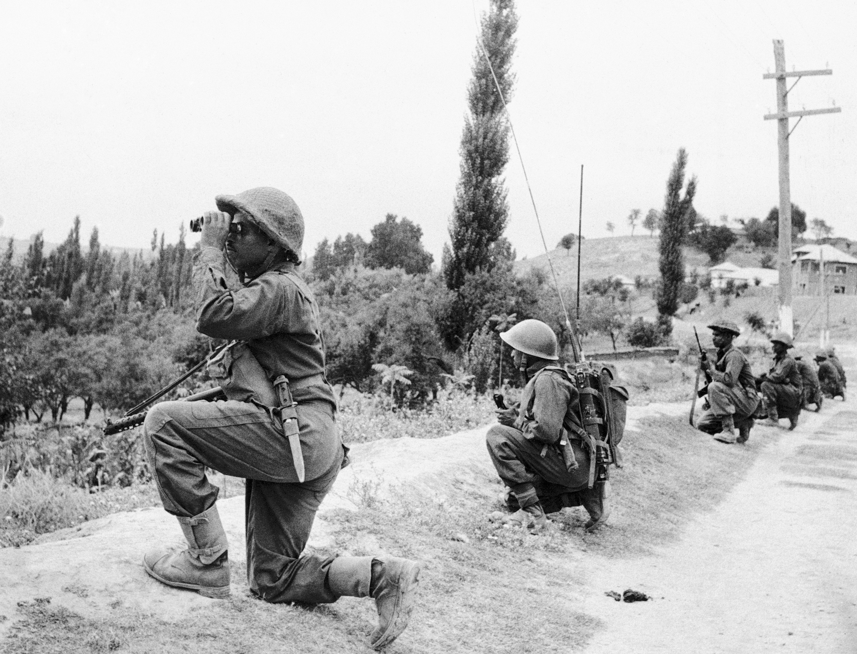 FILE - Indian troops are on the move in Kashmir against guerrilla forces during the second war over Kashmir on Sept. 6, 1965. (AP Photo, File)
