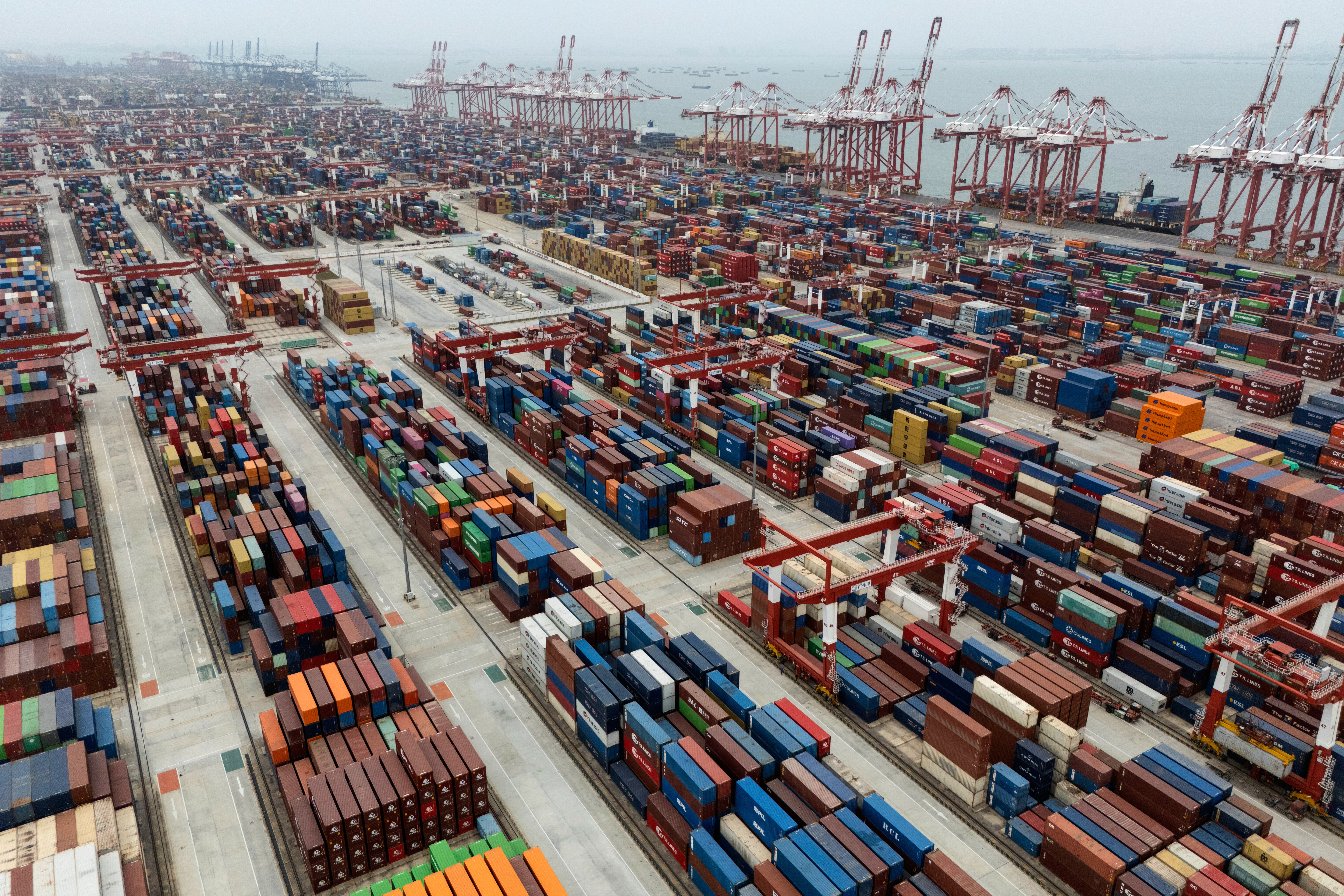FILE - Shipping containers are seen ready for transport at the Guangzhou Port in the Nansha district in southern China's Guangdong province on Thursday, April 17, 2025. (AP Photo/Ng Han Guan)