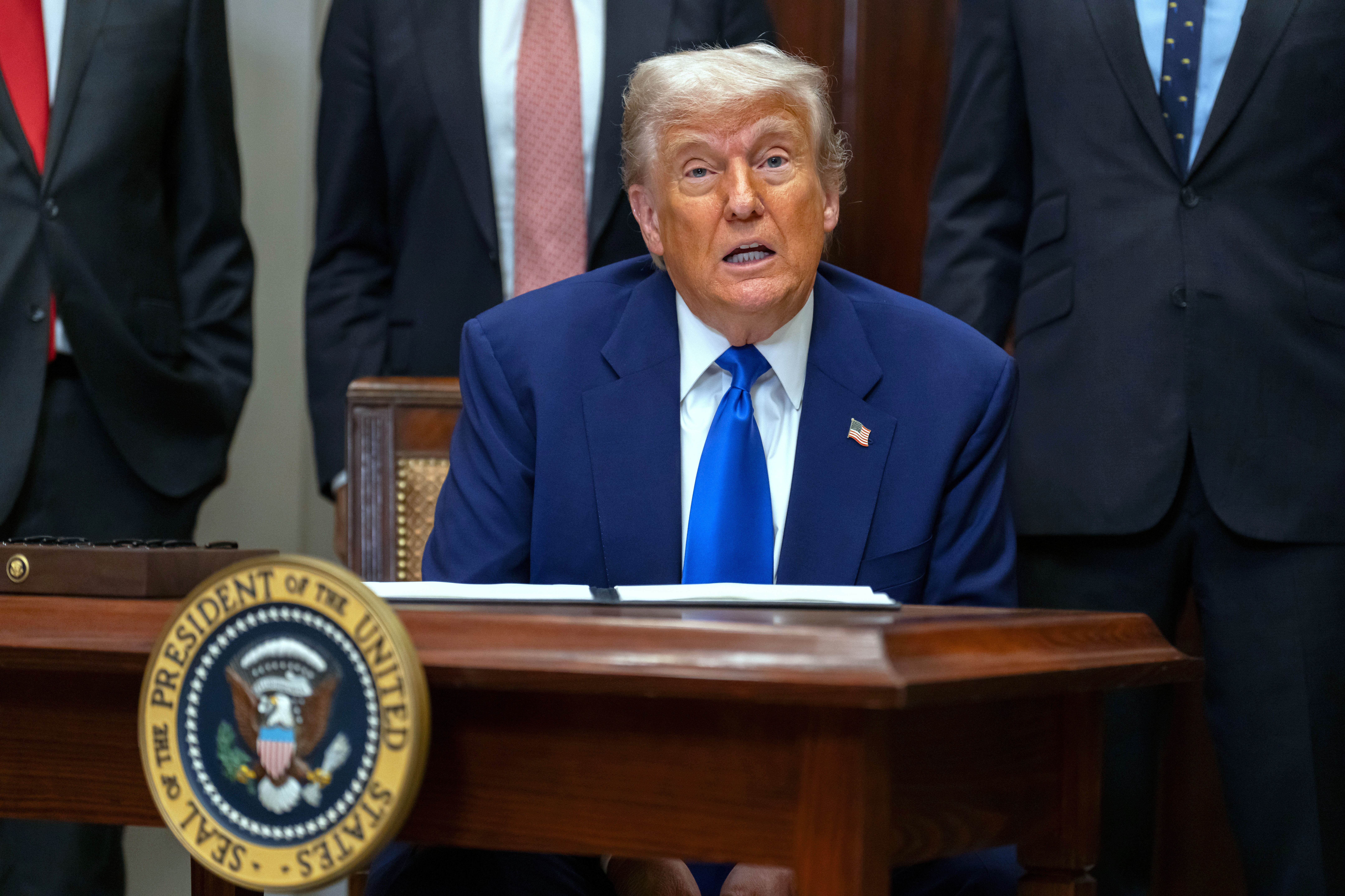 President Donald Trump answers a reporter's question during an event in the Roosevelt Room at the White House, Monday, May 12, 2025, in Washington. (AP Photo/Mark Schiefelbein)