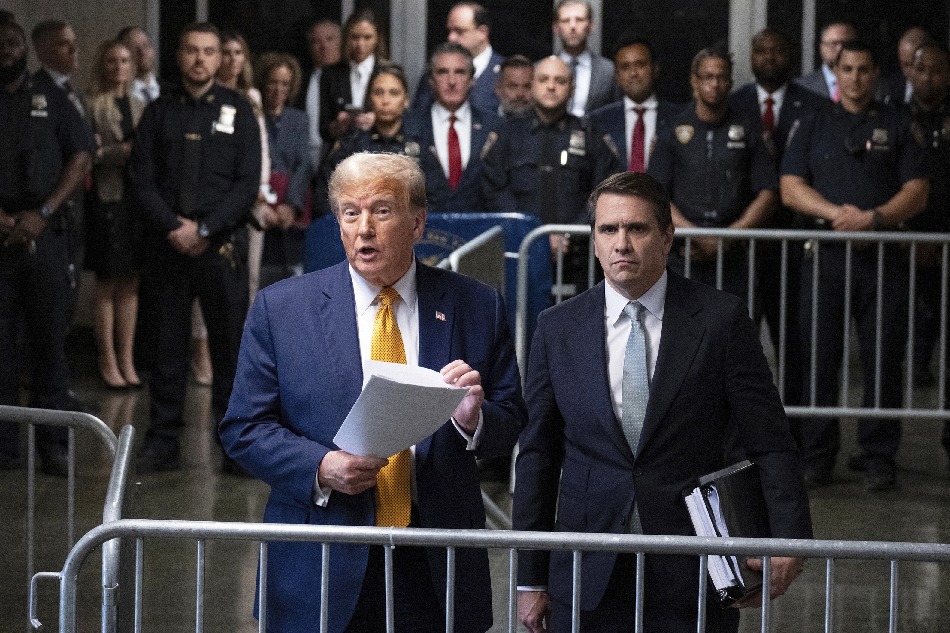 FILE - Former President Donald Trump, left, standing with defense attorney Todd Blanche, speaks at the conclusion of proceedings for the day at his trial at Manhattan criminal court, May 14, 2024, in New York. (AP Photo/Craig Ruttle, Pool, File)