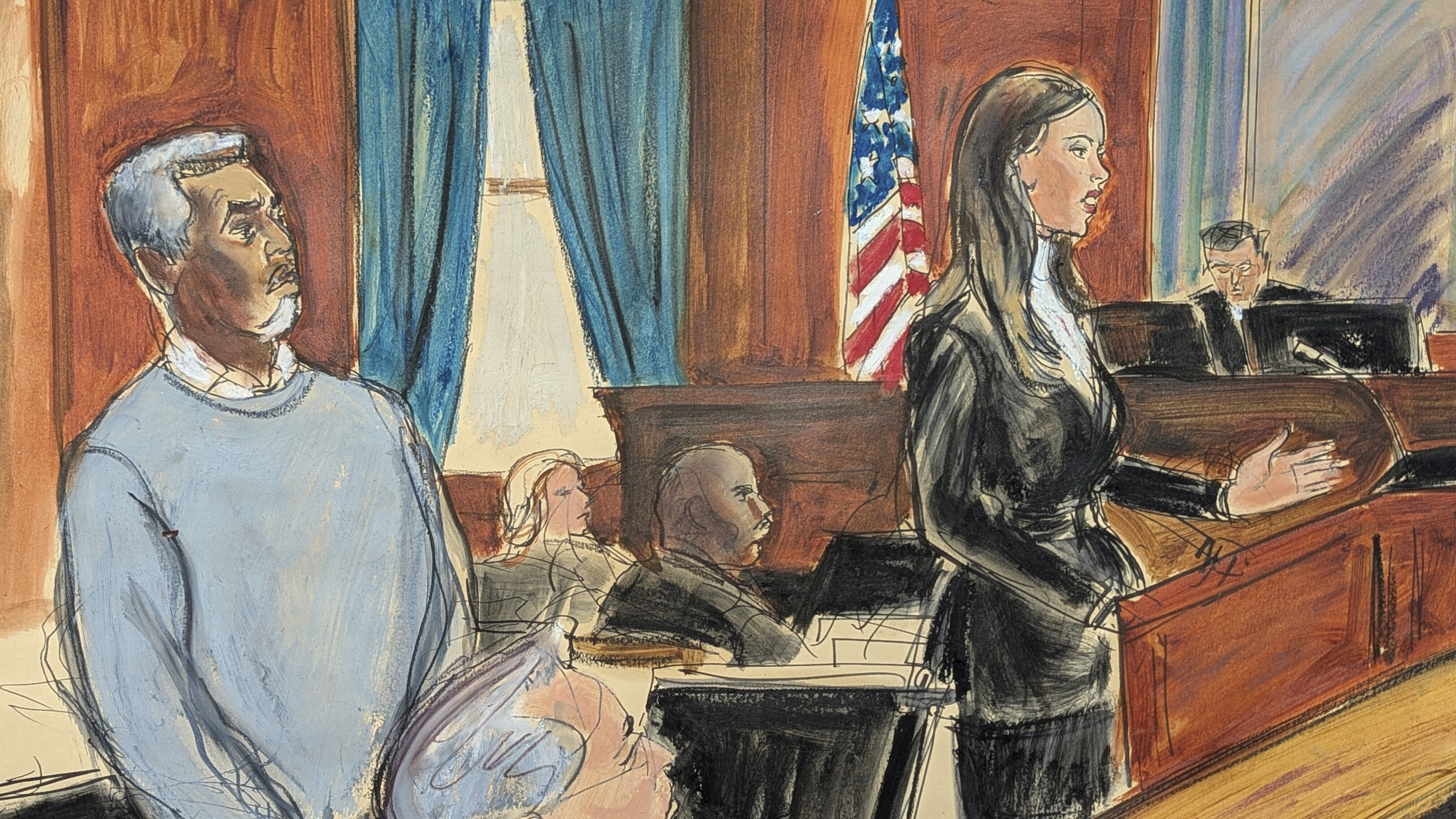 Sean Diddy Combs, left, stands as his defense attorney, Teny Geragos, gives her opening statement to the jury on the first day of trial in Manhattan federal court, Monday, May 12, 2025, in New York. (Elizabeth Williams via AP)