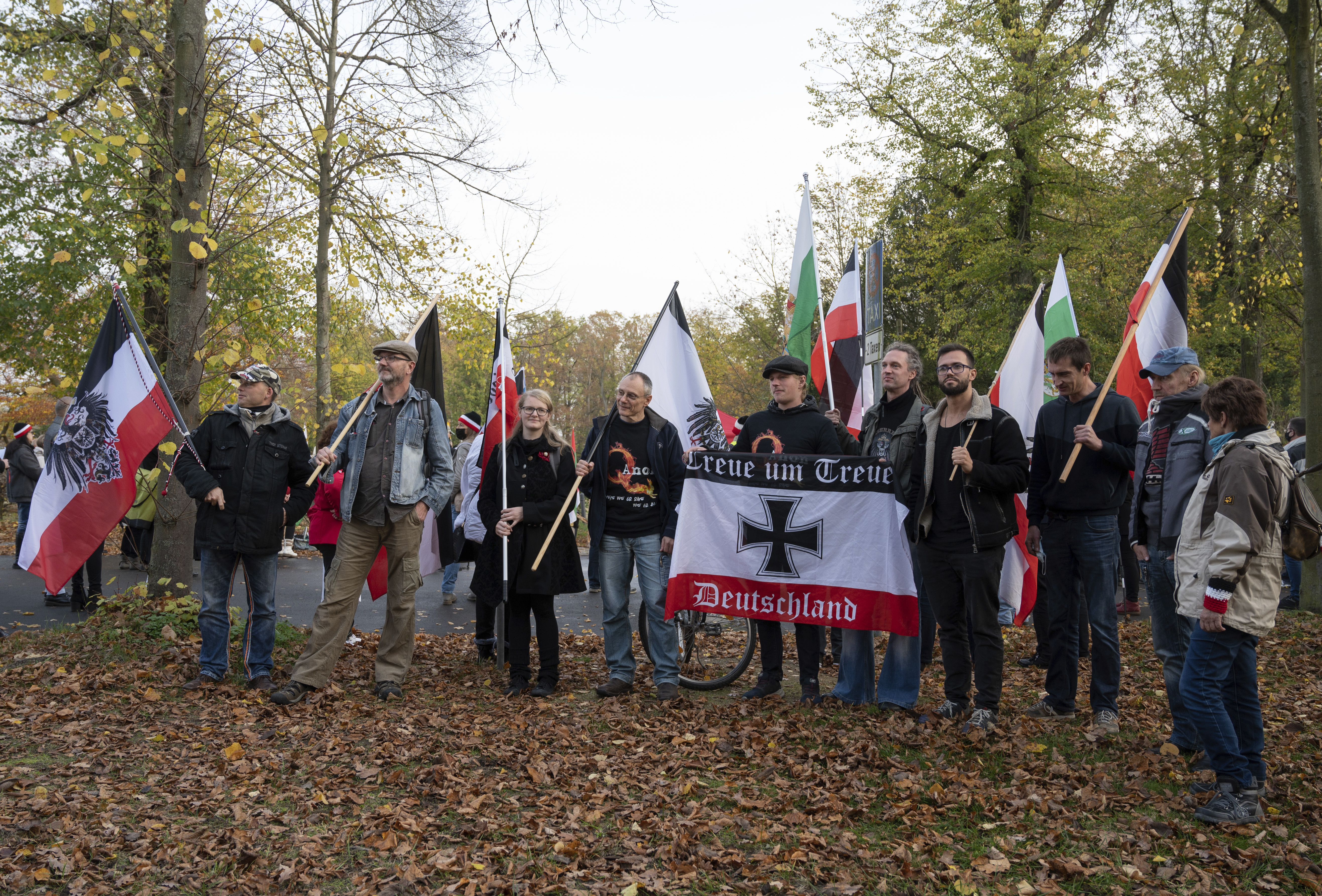 FILE - Participants of a demonstration of Reich citizens carry black and white and other flags in Potsdam, Germany, on Nov. 14, 2020. (Christophe Gateau/dpa via AP, File)